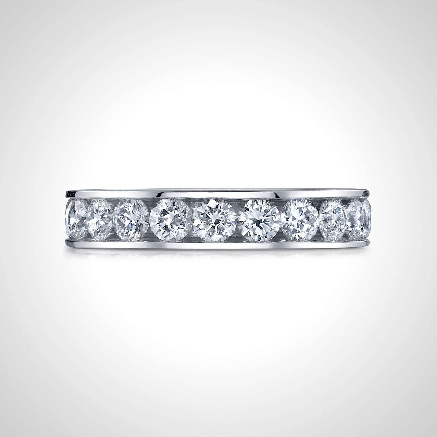 This 18k white gold eternity band features channel-set round diamonds, offering continuous sparkle and timeless elegance. A classic piece that adds a refined touch to any bridal set.-18k White gold-Round diamonds, 1.46cts-Size 6, Contact for sizing optionsItem# 120-00122 Channel Eternity Band