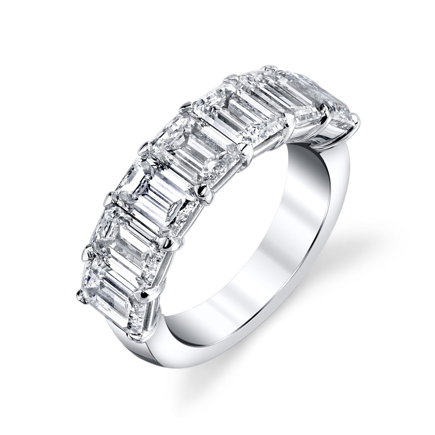 This 18k white gold anniversary band features stunning emerald cut diamonds set in a charming "buttercup" setting. The elegant design enhances the diamonds’ brilliance, making it an unbeatable gift for your next anniversary.-18k White gold-Emerald cut Diamonds, 2.76cts-Size 6, Contact for sizing optionsItem# 120-00182 Emerald Cut Anniversary Band