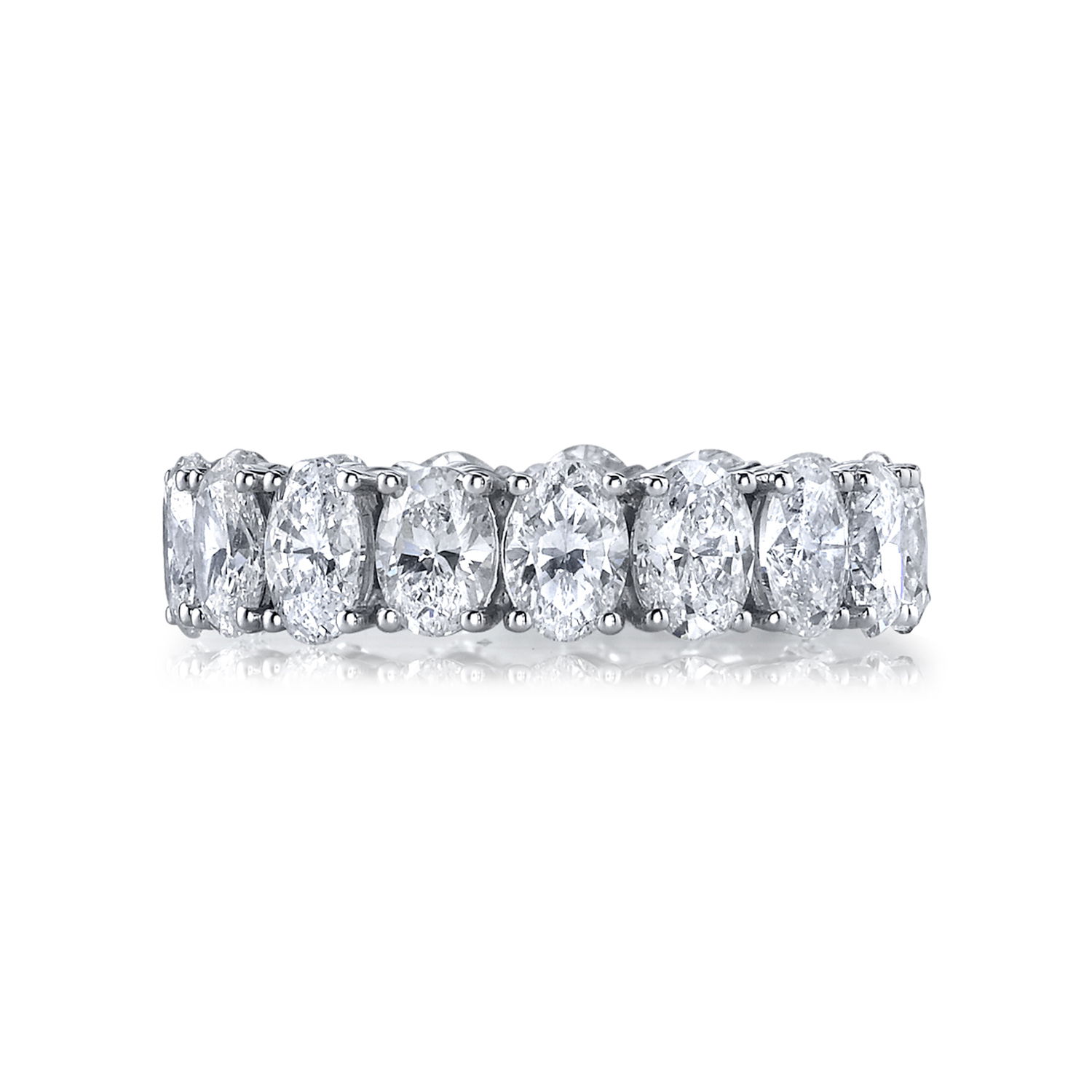 A timeless symbol of elegance, this Platinum eternity band is adorned with oval diamonds set in a delicate "buttercup" setting to enhance their brilliance. Designed for maximum sparkle and sophistication, it's perfect for marking life’s most cherished moments.-Platinum-Oval diamonds, 5.80cts-Size 6, contact for sizing optionsItem# 130-00020 Oval Buttercup Eternity Band