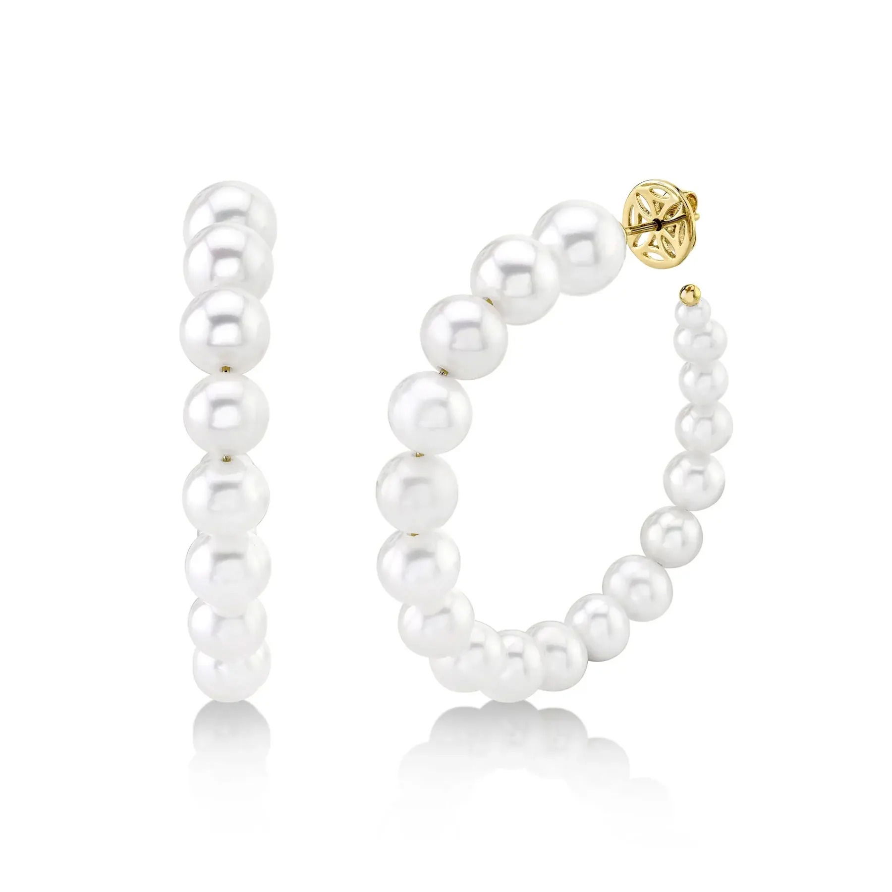 This striking statement piece commands attention with its unique design, ensuring you’ll stand out. All Shy Creation diamonds are natural and hand-selected. All stones are unique and hand set. As a result, you can expect slight variations in the shade, hue, tint of the color stones and stone count.-14k Yellow gold-Pearls, 3.0-9.0mm-Dimensions, 1.80" diameterItem# 310-00294 Cultured Pearl Hoop Earrings