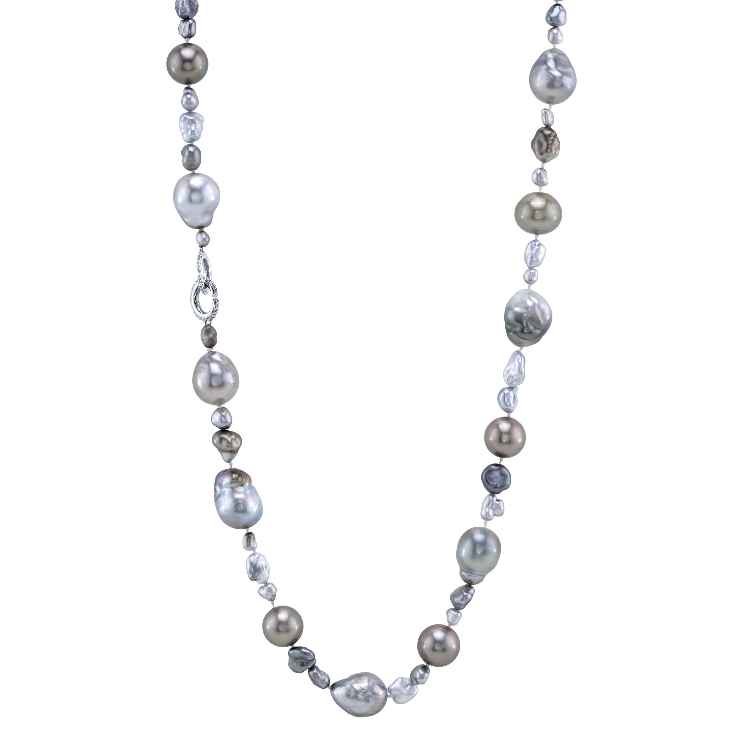 The single-strand "Veronica Necklace" features 16 inches of lustrous Keshi and Tahitian pearls, elegantly set in 14k white gold. Its refined yet organic design makes it a versatile piece, adding a touch of sophistication and natural beauty to any look.-14k White gold-Keshi and Tahitian pearls-Sister hook clasps-Length 19”Item# 325-00220 Veronica Single Strand Necklace 19"