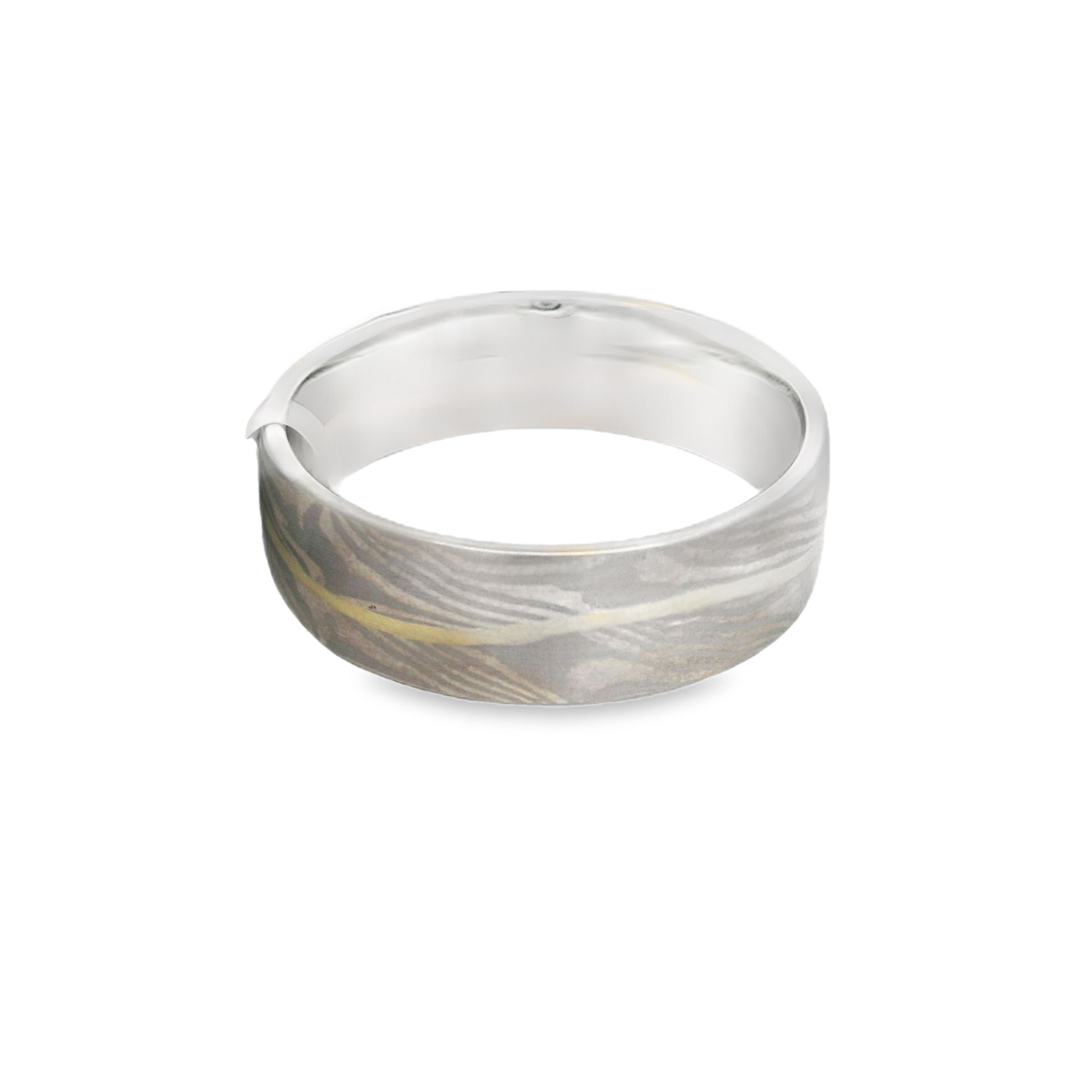 This domed band in 18k yellow gold, sterling silver, and palladium features an elegant Mokume Gane River Pattern, flowing seamlessly around the ring in rich, layered tones. A perfect blend of artistry and tradition, it offers a unique, organic look for those who appreciate exceptional craftsmanship.-18k Yellow gold, Palladium and Sterling Silver-7mm-Size 10, Contact for sizing optionsItem# 405-00051 Mokume Gane River Band