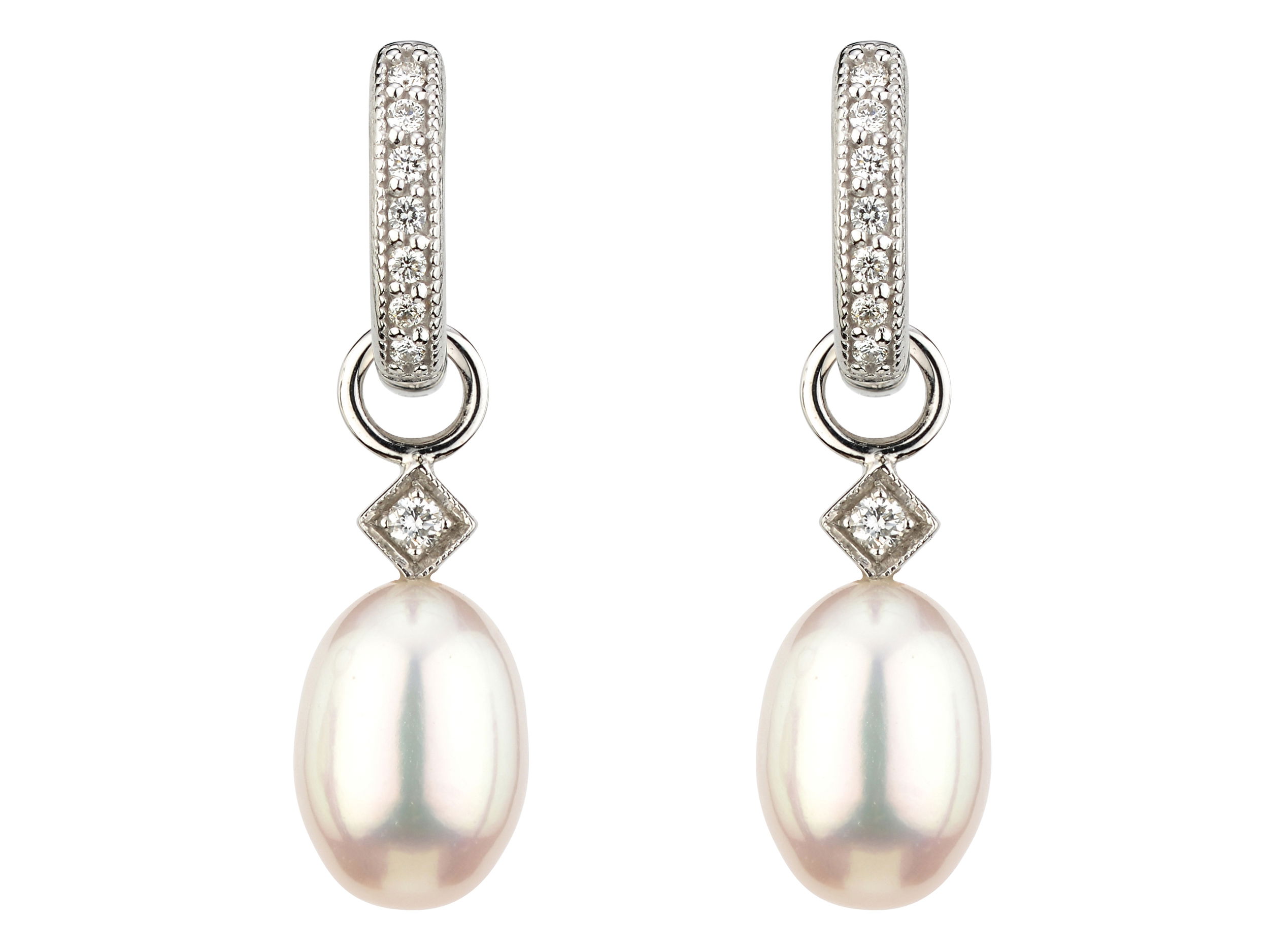 Combining classic elegance with on trend shapes and styles, JFJ offers something for women of all ages. These elegant charms feature luminous pearls that add a touch of timeless sophistication. Perfect for enhancing your earrings or creating a personalized look, they bring classic beauty to any jewelry collection. Hoops and charms sold separately.-18k White gold-White pearls-Round diamonds, 0.05ctsItem# 425-01608 Pearl Briolette Charms