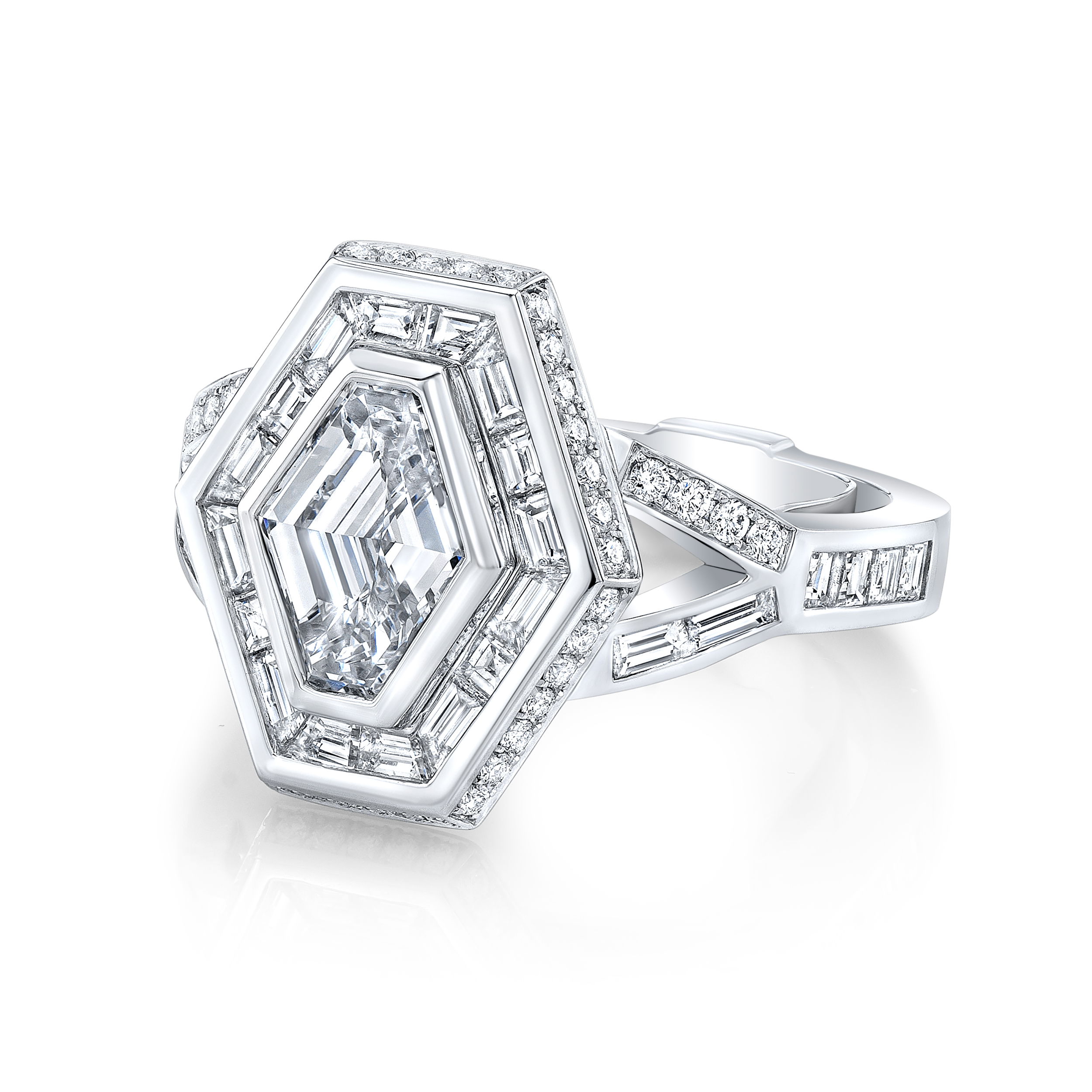 This platinum ring features a unique hexagonal lozenge design, accented with sparkling diamonds. Bold and distinctive, it adds a modern edge to any collection.-Platinum-Hexagonal lozenge, D-F/VS+ 1.51cts-Diamonds, D-F/VS+ 1.65cts-Size 7Item# 001-130-01066 Diamond Lozenge Ring