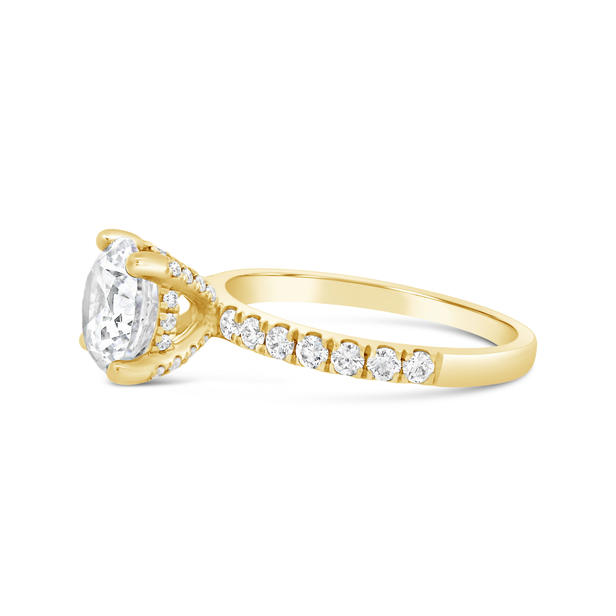 A delicate touch of brilliance, this semi-mount features a hidden halo that adds a subtle yet stunning sparkle beneath your chosen center stone. Designed for those who appreciate understated elegance, this setting enhances the diamond’s brilliance while maintaining a clean and timeless look. (Center Stone Not Included)-18k Yellow gold-Round diamonds, 0.38cts-Size 6.25, Contact for sizing optionsItem# 140-00225 Round Diamond Solitaire Mounting