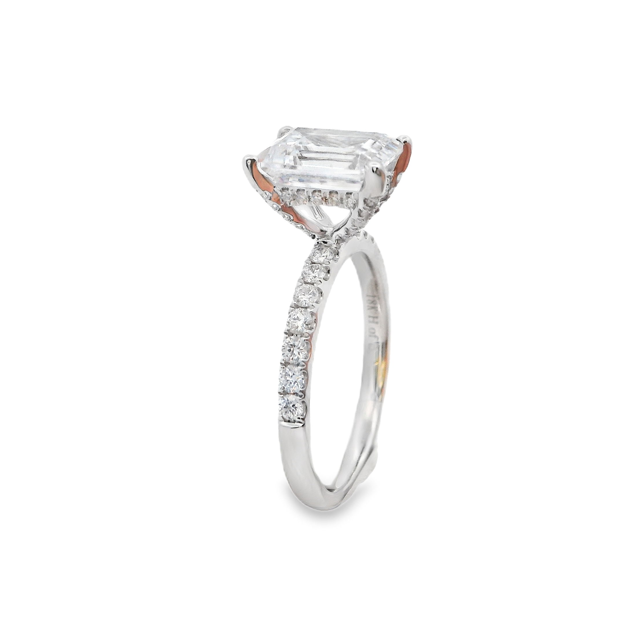 Timeless elegance meets brilliant sparkle. This 18k White gold semi-mount is designed to enhance your chosen center stone, the shimmering diamonds along the band add a touch of luxury and sophistication. A perfect setting for a ring that radiates beauty from every angle. (Center stone not included)-18k White gold-Round Diamond 0.42cts -Size 6.25, Contact for sizing optionsItem# 140-00227 White Gold Diamond Solitaire