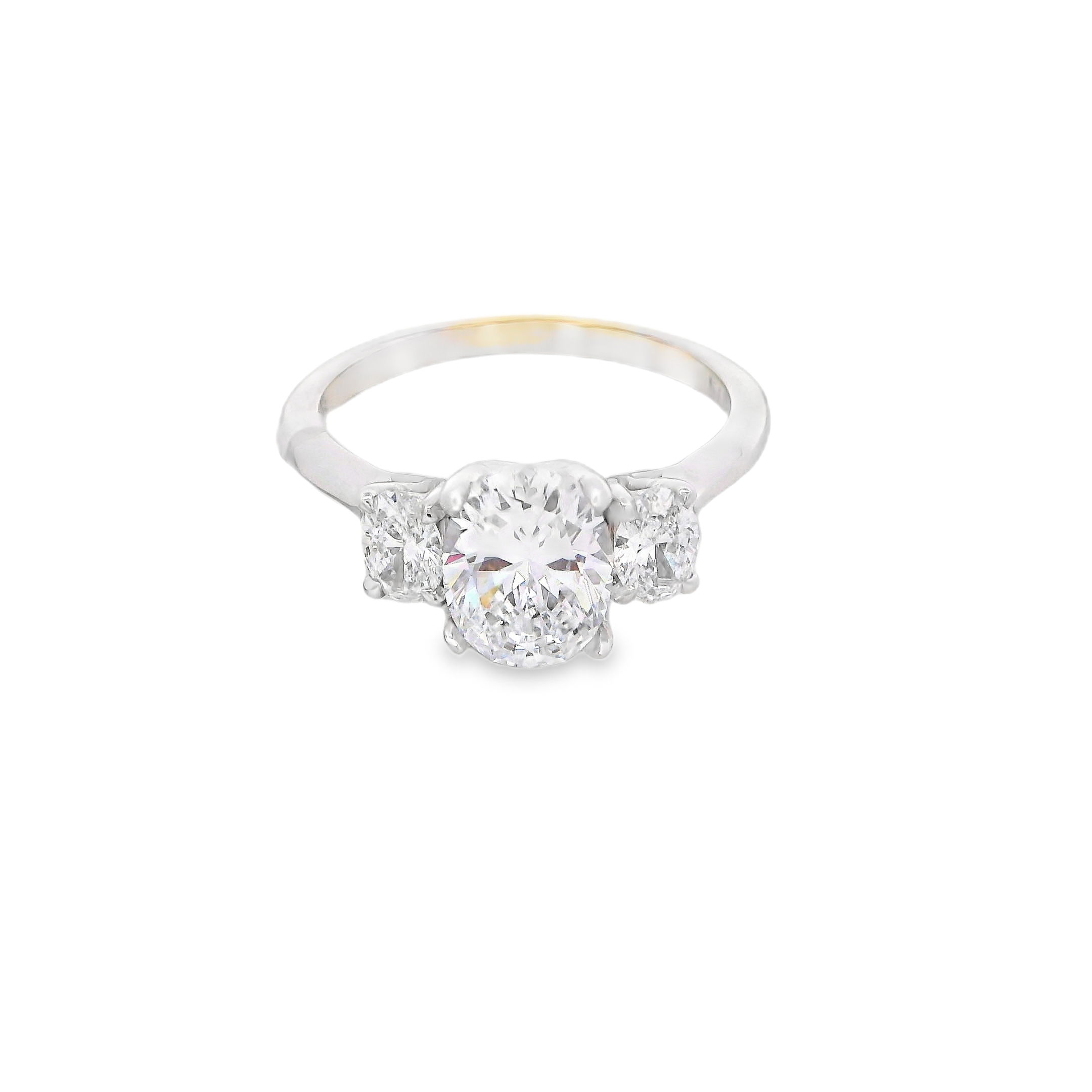 This three-stone semi-mount is a timeless symbol of past, present, and future. Designed to hold an oval center stone, it's flanked by two perfectly matched side stones for added brilliance and balance. (Center stone not included)-14k White gold-Oval diamonds, 0.50cts-Size 7, Contact for sizing optionsItem# 140-00230 Oval Three-Stone
