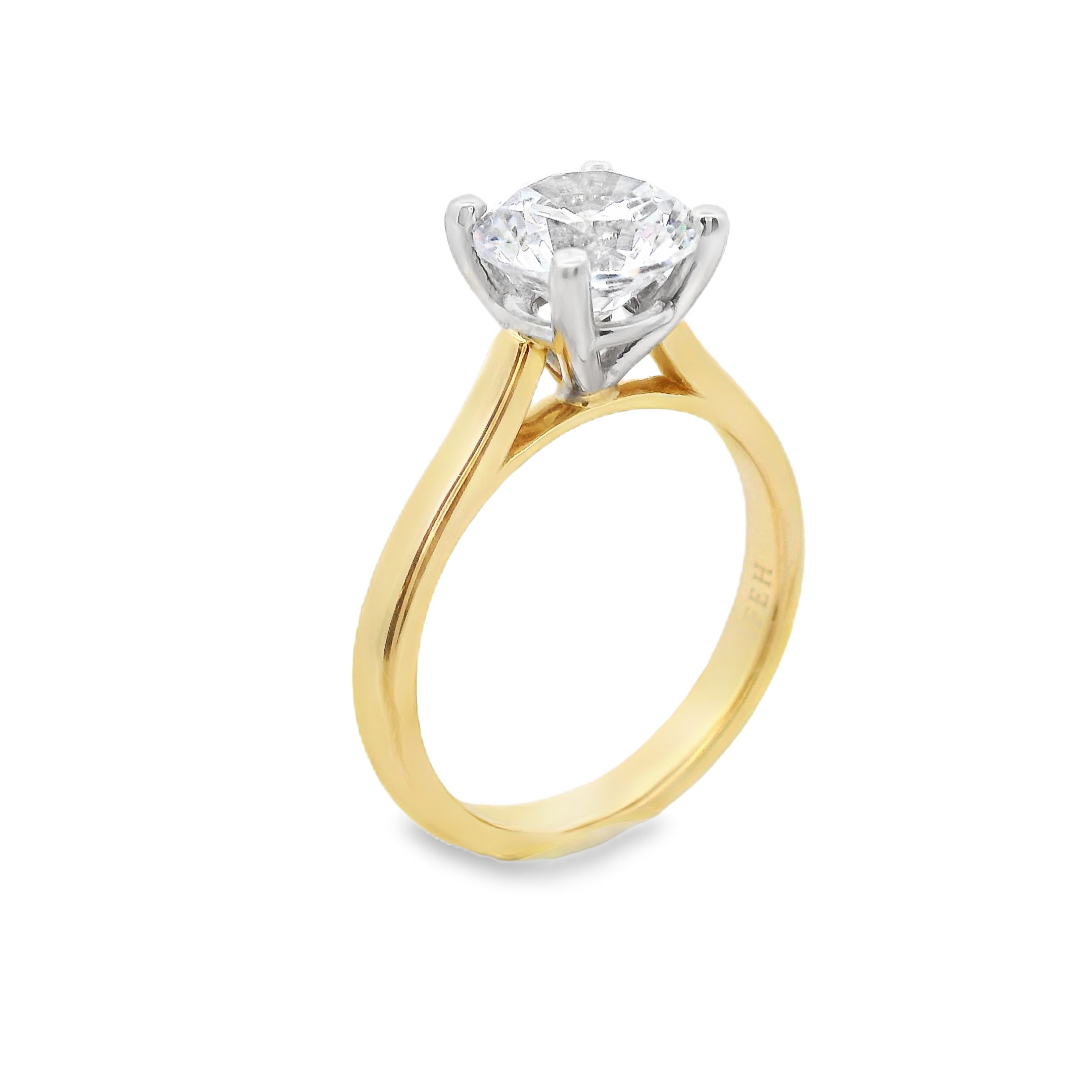 The timeless Naifeh Solitaire semi-mount in 18k Yellow gold features an elegant cathedral setting and is all hand-crafted in house. Its sophisticated design is customizable to fit any shape and size stone, offering endless possibilities to create the perfect ring to match your unique style. Make this exquisite piece truly yours. (Center stone not included)-18k Yellow gold shank with white gold head-Size 6.5, Contact for sizing optionsItem# 140-00240 Naifeh Solitaire