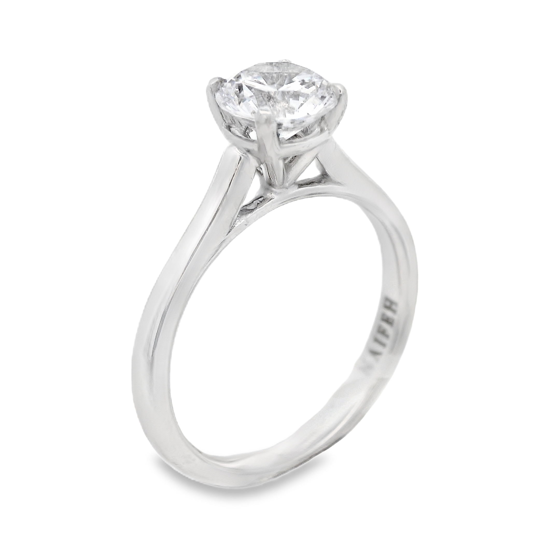 The timeless Naifeh Solitaire semi-mount in 18k White gold features an elegant cathedral setting and is all hand-crafted in house. Its sophisticated design is customizable to fit any shape and size stone, offering endless possibilities to create the perfect ring to match your unique style. Make this exquisite piece truly yours. (Center stone not included)-18k White gold-Size 6.5, Contact for sizing optionsItem# 140-00242 Naifeh Solitaire