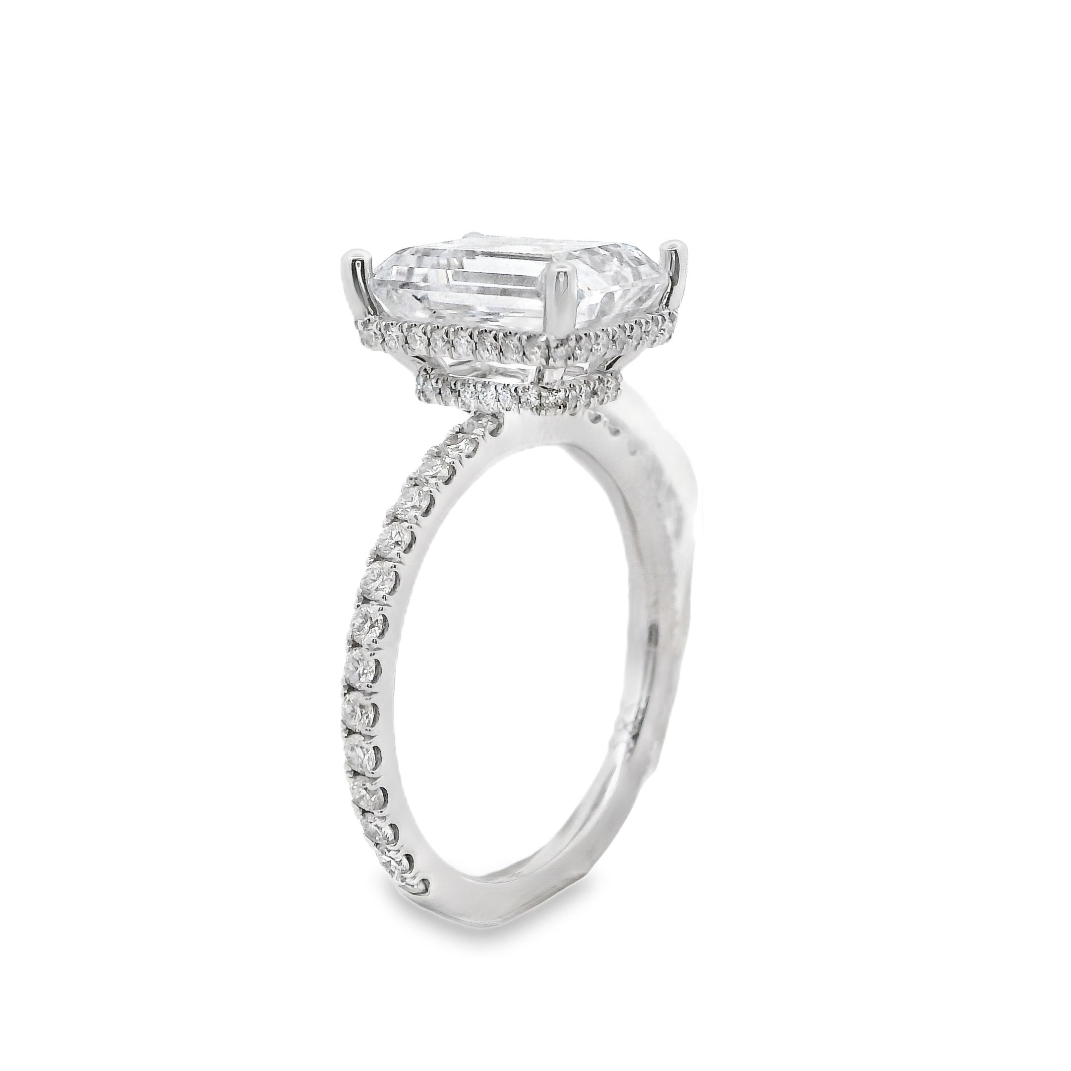 Elevate your center stone with this stunning 18k White gold and diamond semi-mount, featuring a double hidden halo for extra brilliance from every angle. The delicate yet dazzling design enhances the sparkle of your diamond while maintaining a refined and sophisticated look. A perfect choice for those who love subtle yet radiant details. (Center stone not included)-18k White gold-Round Diamonds, 0.55cts-Size 6.5, Contact for sizing optionsItem# 140-00245 Hidden Halo Semi-Mount