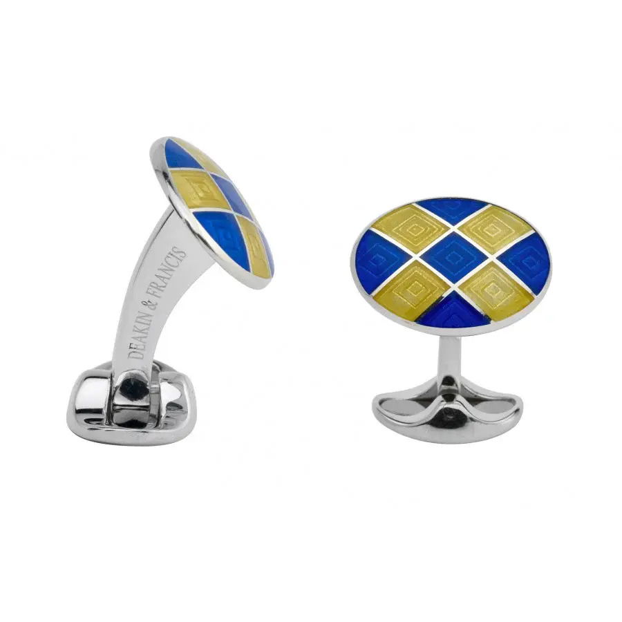 These Deakin & Francis cufflinks feature a striking combination of vibrant blue and yellow enamel set in sterling silver, exemplifying expert craftsmanship and timeless design. Perfectly handcrafted in England, they add a sophisticated pop of color to elevate any formal ensemble.-Sterling silver-Blue and yellow enamel-Item# 001-800-00351 Blue and Yellow Mens Cufflinks