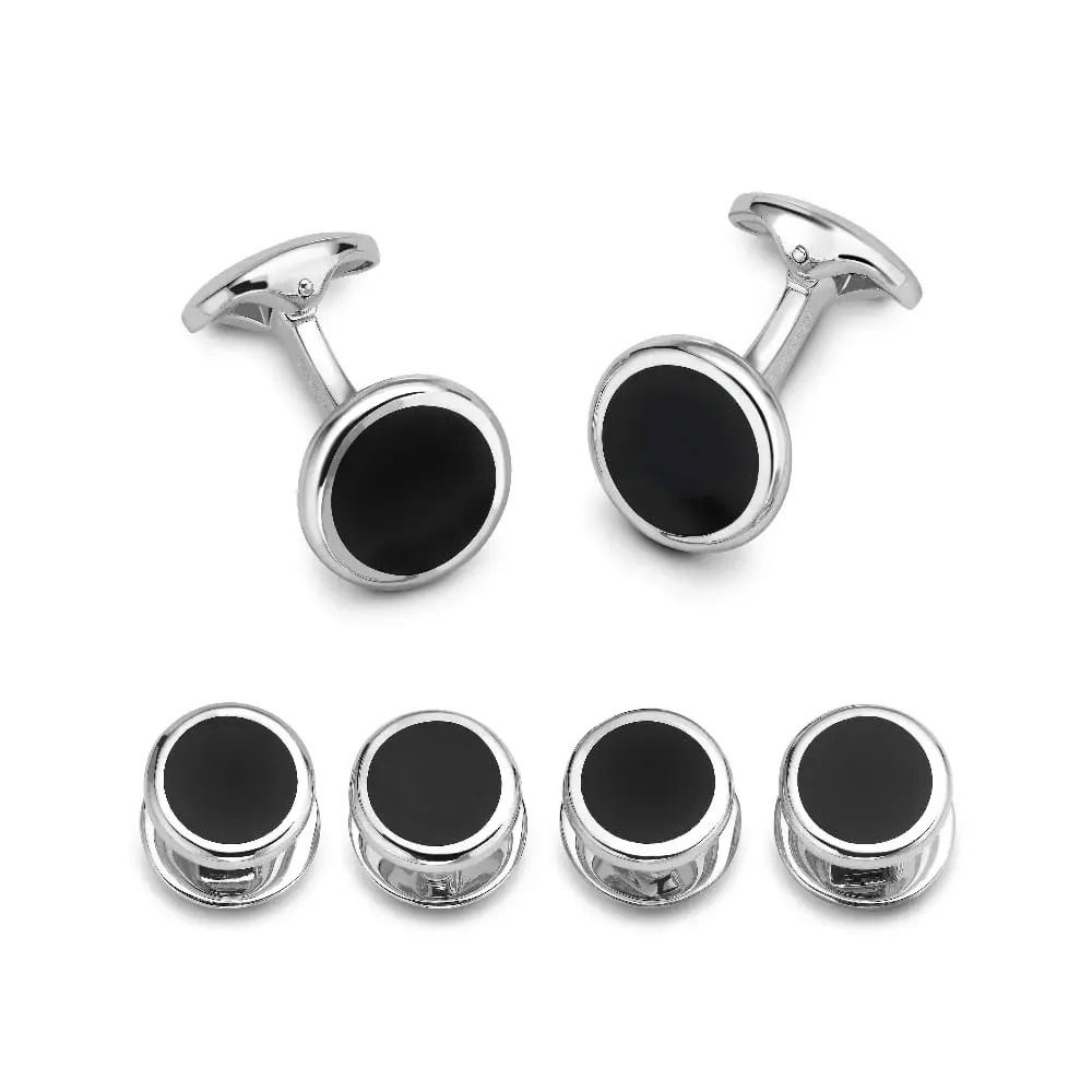 Elevate your formalwear with the Deakin & Francis Black Onyx Cufflinks and Stud Set, crafted for timeless sophistication. Featuring polished metal and smooth black onyx, this set adds a bold, elegant touch to any tuxedo look.-Sterling silver-Black onyx-Item# 001-800-00419 Black Onyx Cufflinks and Stud Set