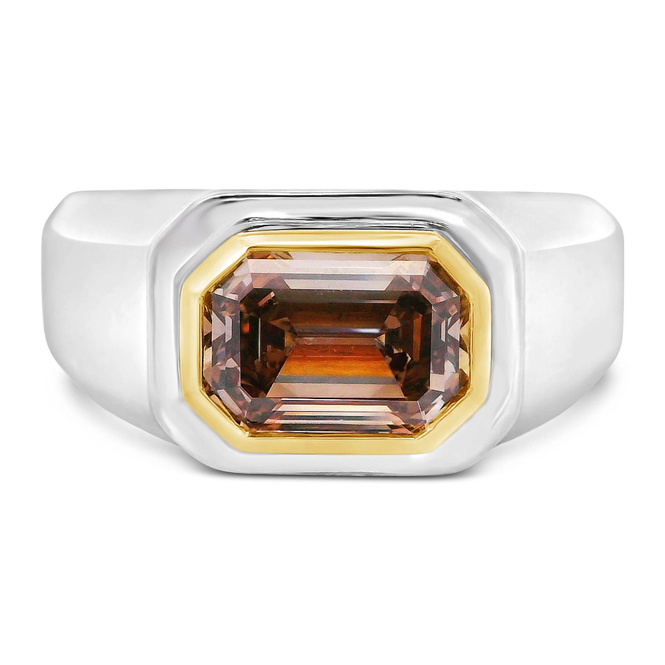 Crafted from rich 18k yellow and white gold and crowned with a captivating emerald shaped 3.04ct cinnamon colored diamond, this ring offers a perfect blend of luxury and masculinity. It's designed for those who appreciate the finer details in a minimalist, powerful style.-18k White and yellow gold-Natural brown diamond, 3.04ctSize 10.5. Contact for sizing options.Item# 800-2000001 The Stud Diamond