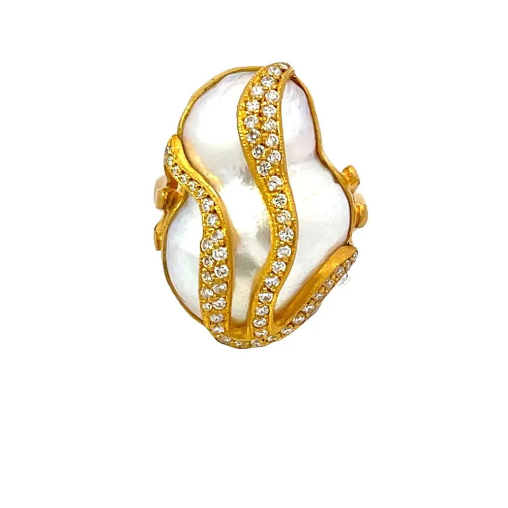 Introducing the Lydia Ring—a one-of-a-kind masterpiece crafted in lustrous 24k yellow gold. This exquisite piece features a stunning Tahitian pearl complemented by sparkling diamonds, creating a harmonious blend of elegance and sophistication. -24k Yellow gold-Diamonds, 0.40 cts-Tahitian pearl 13x23.5mm-Size 7Item# 804-00571 Lydia Pearl Ring