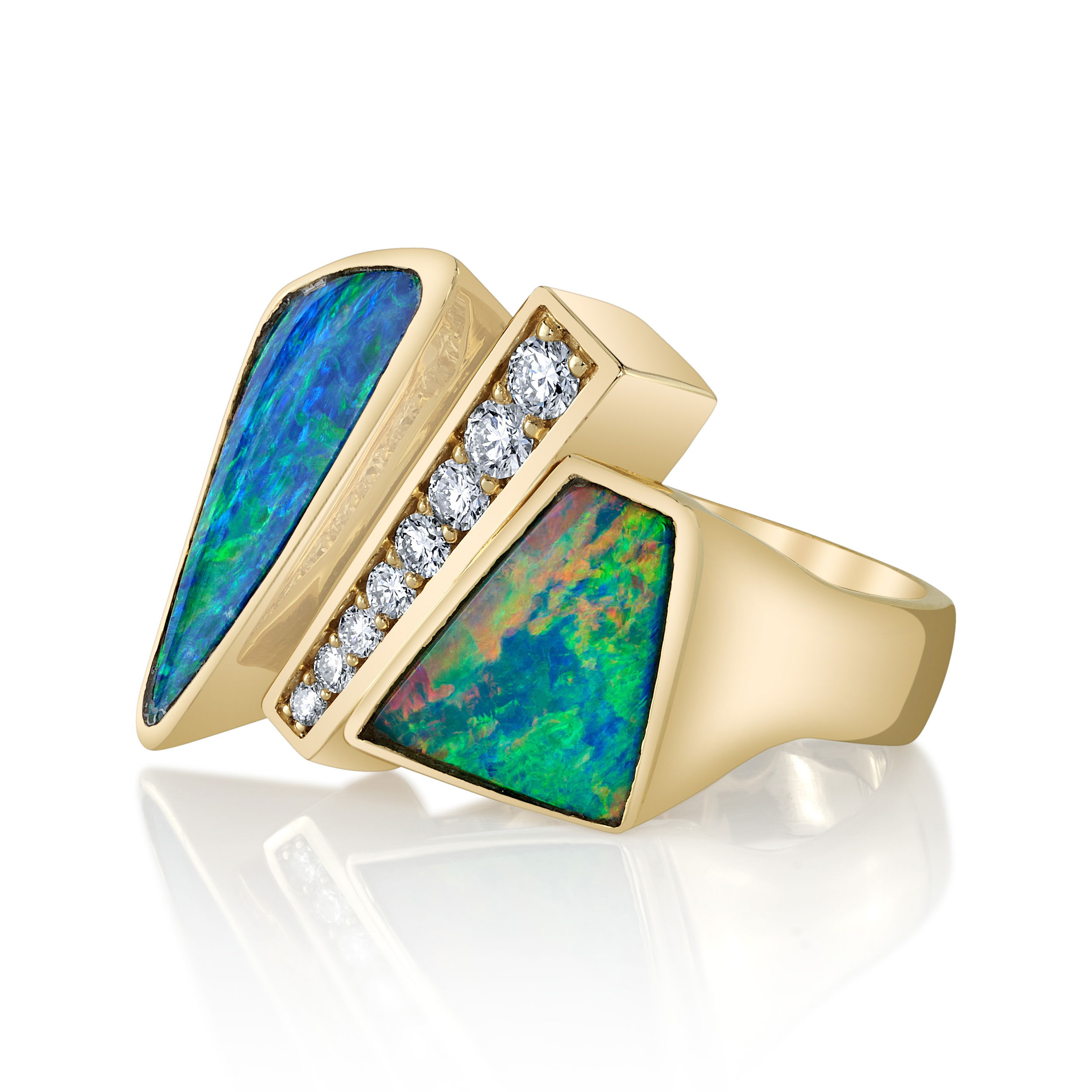 This ring features a striking boulder opal doublet set in 18k yellow gold, accented by sparkling round diamonds. The unique and vibrant colors, paired with the brilliance of the diamonds, create a bold and elegant statement piece.-18k Yellow gold-Boulder opal doublets-Round diamonds, 0.45ctsItem# 804-00678 POW-er in Opal Doublets Ring