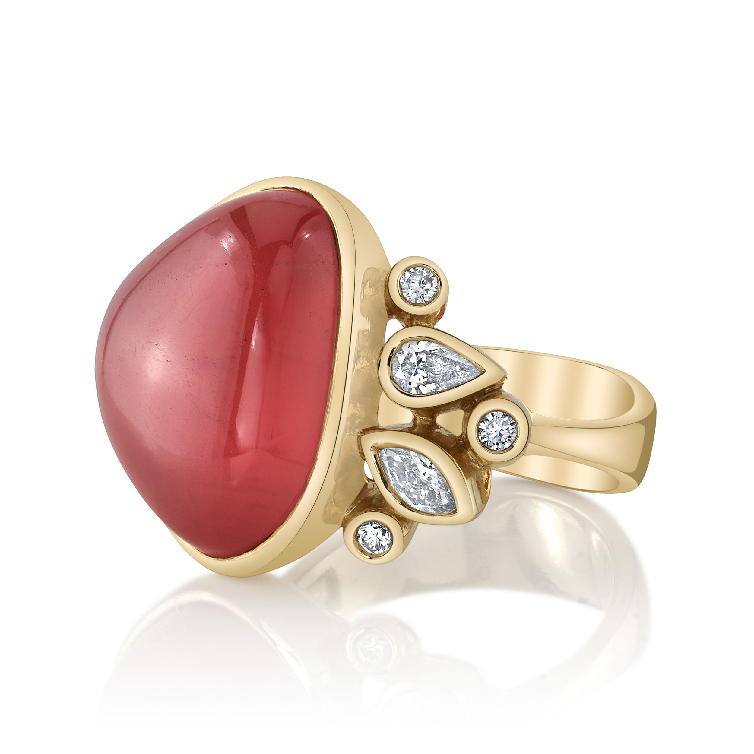 This elegant rhodochrosite ring showcases pear and round diamonds set in 18k yellow gold, adding a touch of sparkle and sophistication. With its rich coral hues and shimmering diamonds, it's the perfect statement piece for those who embrace bold, vibrant style.-18k Yellow gold-Rhodocrystite, 19.48ct-Pear and round diamonds, 0.46cts-Size 6.5. Contact for sizing options.Item# 804-00679 Fiora Ring