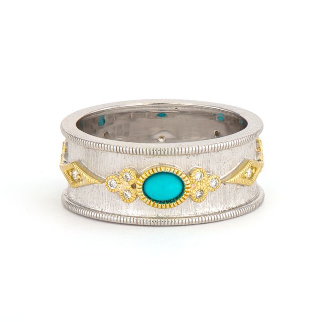 Combining classic elegance with on trend shapes and styles, JFJ offers something for women of all ages. This mixed metal piece allows you to mix and match with any and all of your favorite jewelry items! Enjoy a versatile ring, to be stacked or worn alone. -18k Yellow gold-Sterling silver-Turquoise-Round white diamondsItem# 804-00697 Mixed Metal Turquoise Ring