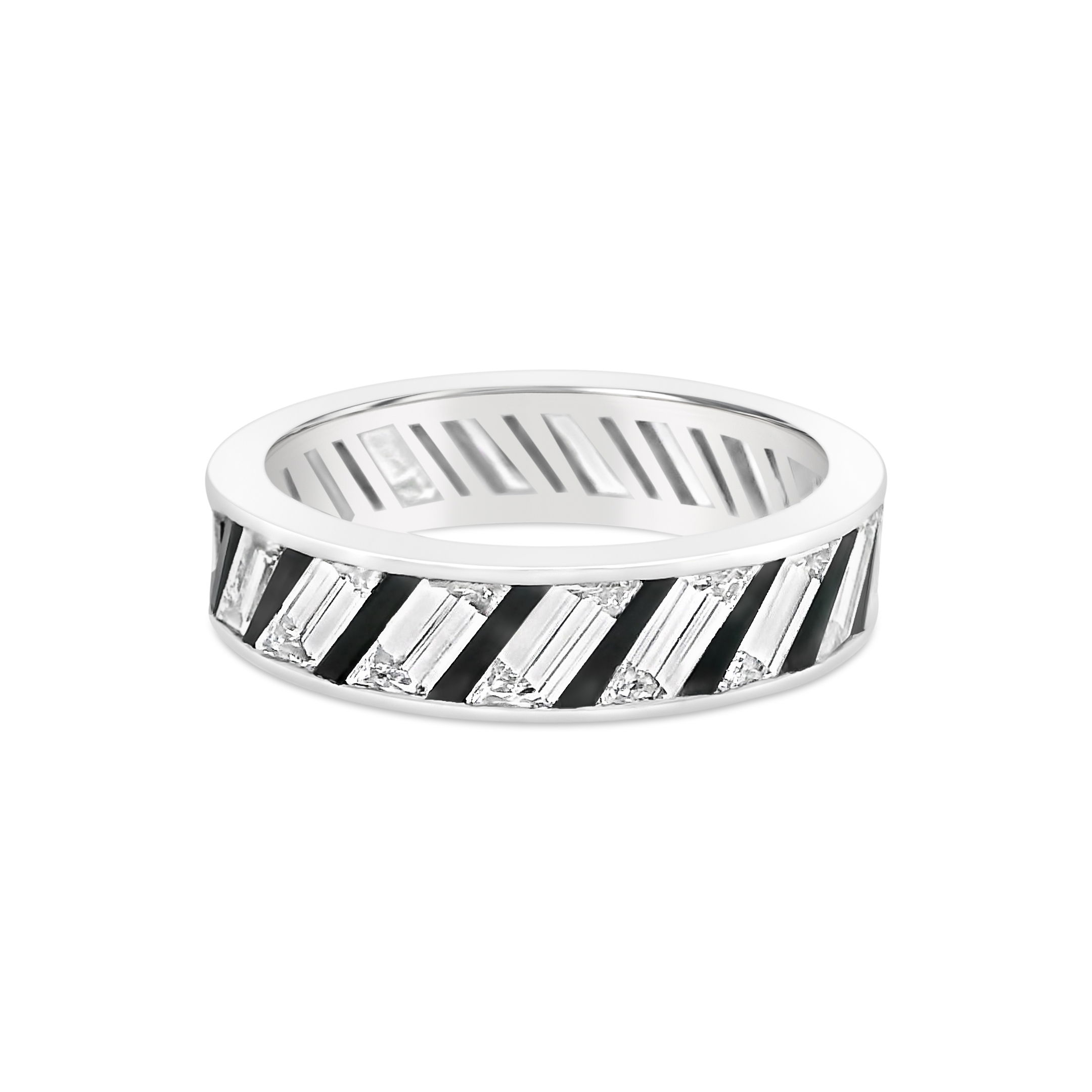 This eternity band features a sleek onyx inlay, creating a striking contrast with the baguette diamonds. Perfect for daily wear or special occasions, this ring is promised to impress. Cicada atelier is located in the heart of the New York City jewelry district on 47th street, where each unique piece is meticulously handcrafted.-Platinum -Baguette diamonds, 2.68cts -Size 7Item# 804-00774 Diamond & Onyx Inlay Ring