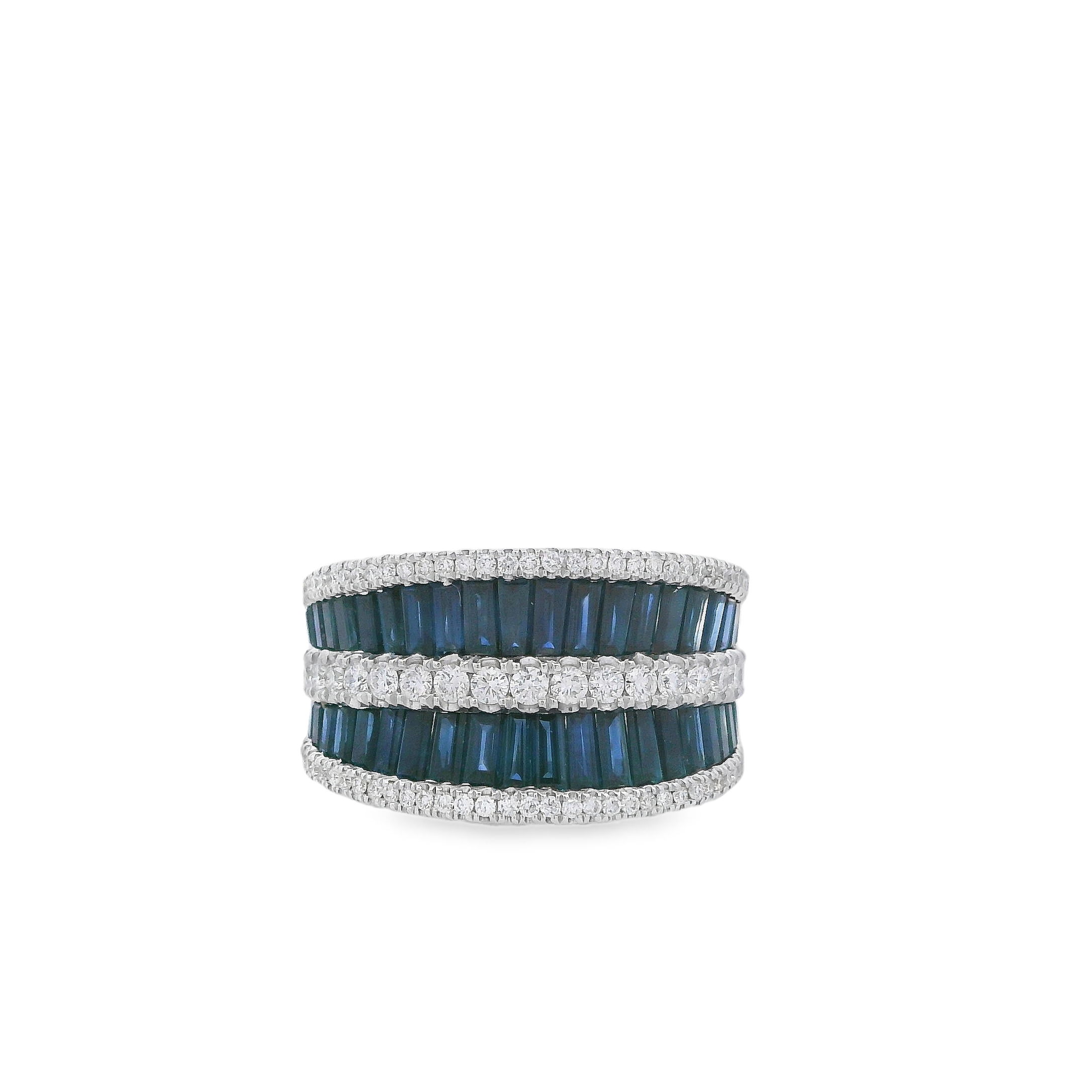 Make a bold statement with this exquisite wide band ring, featuring a captivating arrangement of brilliant diamonds and deep blue sapphires. The striking contrast between the luminous diamonds and the rich sapphires creates a timeless and sophisticated look. -18k White gold-Round Diamonds, 0.61cts-Baguette blue sapphires, 2.88cts-Size 6.5, Contact For Sizing OptionsItem# 804-00797 Sapphire & Diamond Ring