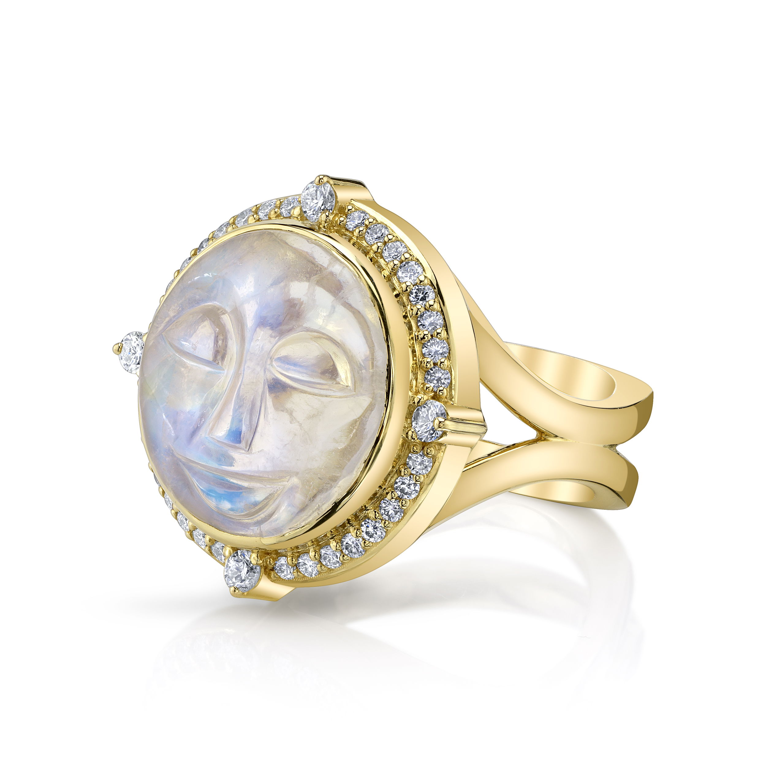 This ring is a smaller scale version of the Nevaeh ring that reflects the captivating beauty of this collection. It presents a uniquely carved moonstone, surrounded by radiant diamonds and a rich yellow gold setting.-18k Yellow gold-Carved moonstone face-Round diamonds, 0.50ctsItem# 804-00857 Mini Nevaeh Ring