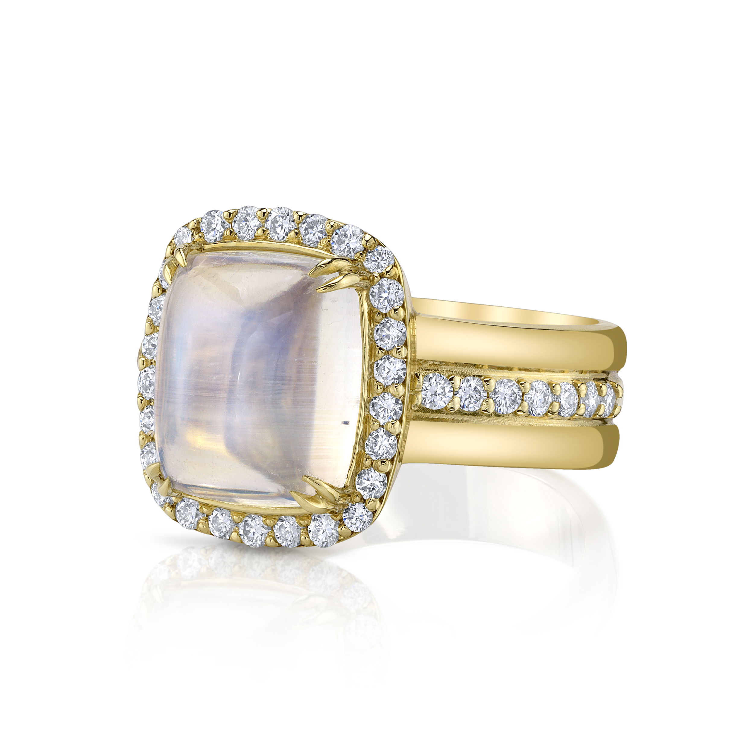 A serene moonstone glows gently at the center of this elegant ring, encircled by a halo of twinkling diamonds and set in warm 18k yellow gold. Add this stunning piece to any ensemble for a dazzling finishing touch.-18k Yellow gold-Cabochon moonstone, 5.10cts-Round diamonds, 0.58ctsItem# 804-00865 Elysia Ring