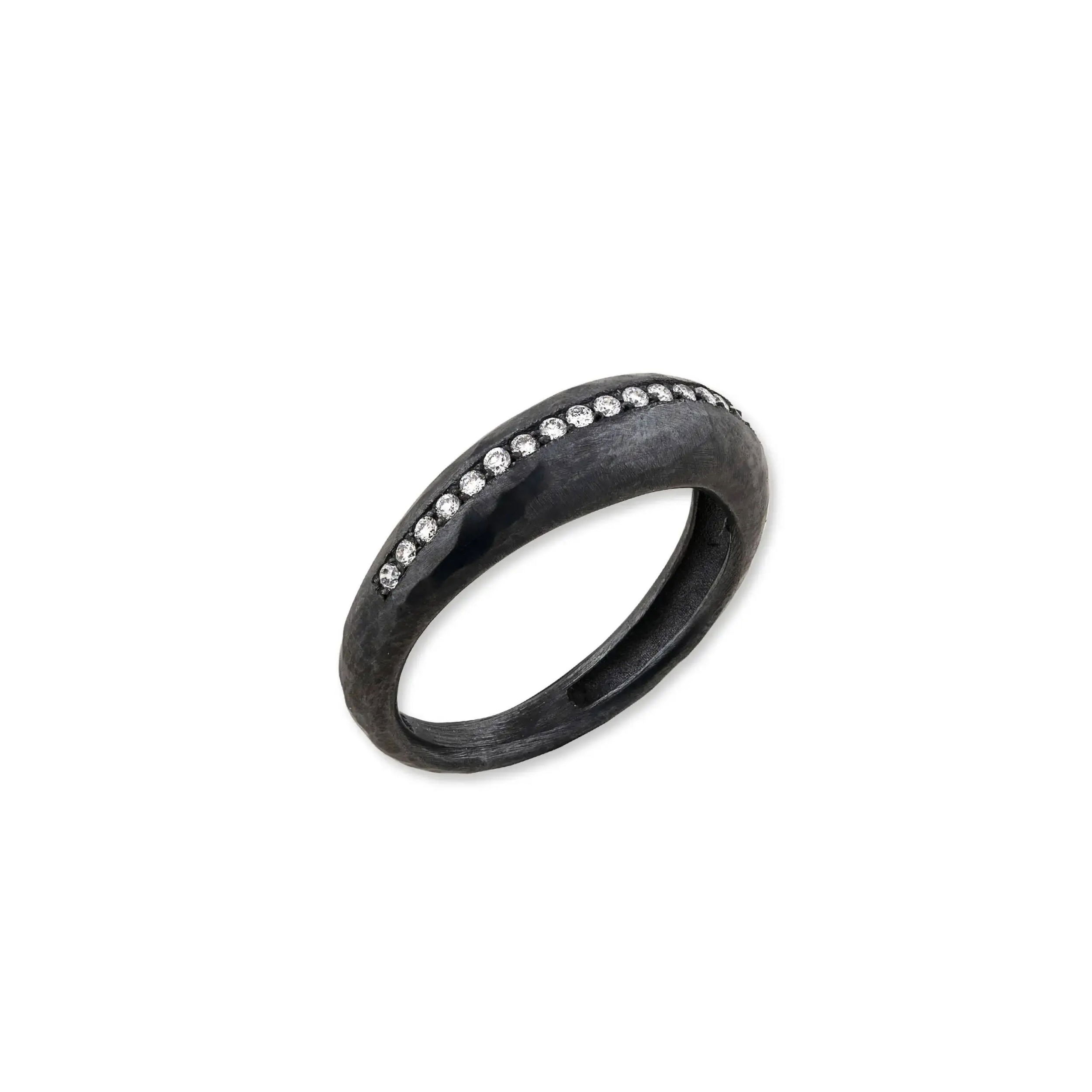 This oxidized sterling silver ring features a stunning hammered finish, offering a bold, textured look. Accented with sparkling diamonds, it combines timeless elegance with a modern edge.-Oxidized silver-Round diamonds, 0.19cts-Size 6.5Item# 001-804-00868 Hammered Oxidized Silver and Diamond Ring