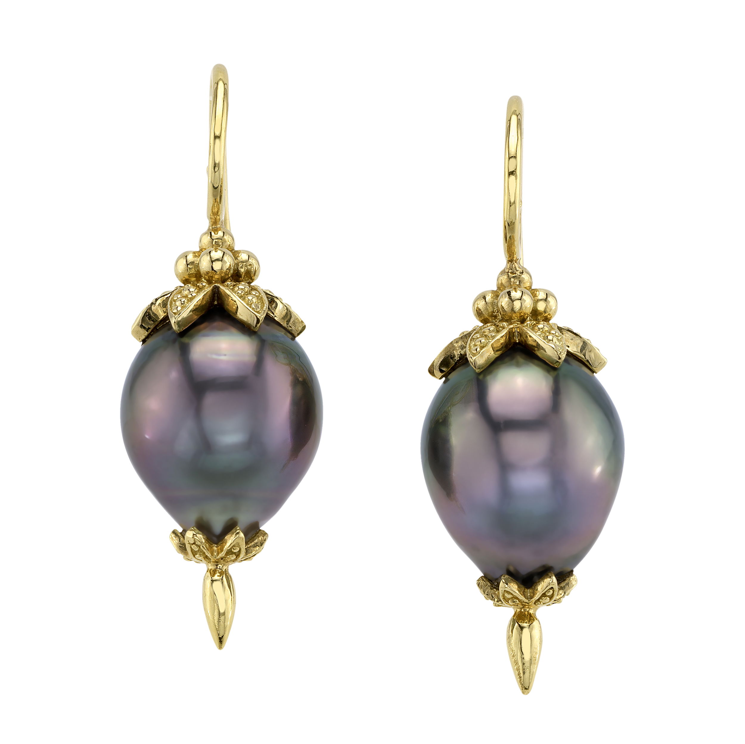 These earrings feature stunning Tahitian pearls set in 18k yellow gold, creating a beautiful contrast between the rich, dark pearls and the warm gold. Elegant and timeless, they add a touch of sophistication to any occasion.-18k Yellow gold-Tahitian pearlsItem# 805-01389 Rosemary Earrings