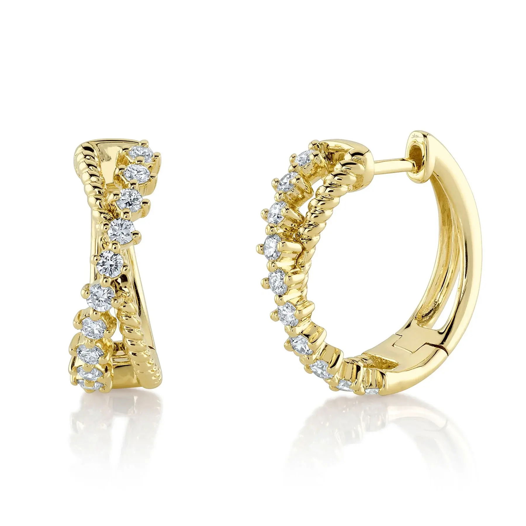 Effortless elegance that suits both casual days and sophisticated evenings. All Shy Creation diamonds are natural and hand-selected. All stones are unique and hand set. As a result, you can expect slight variations in the shade, hue, tint of the color stones and stone count.-14k Yellow gold-Round diamonds, 0.35Ct-Dimensions, 0.65" diameterItem# 805-01586 Diamond Bridge Hoop Earrings