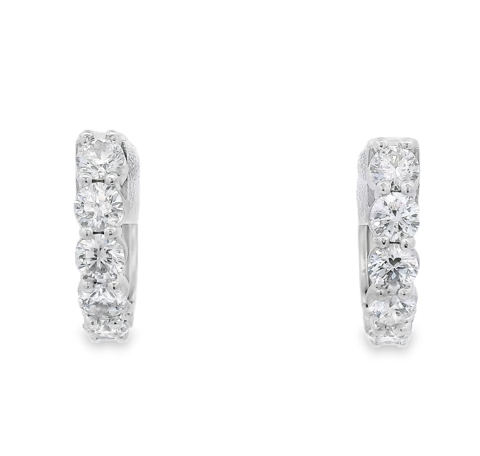 These 14k white gold huggies are set with brilliant round diamonds for just the right touch of shine. Boasting versatility, they have been designed as the perfect earrings for all occasions, such as any special event or as beautiful daily wear pieces.-14k White gold-Round diamonds, 0.85ctsItem# 805-01690 Line Huggie Earrings