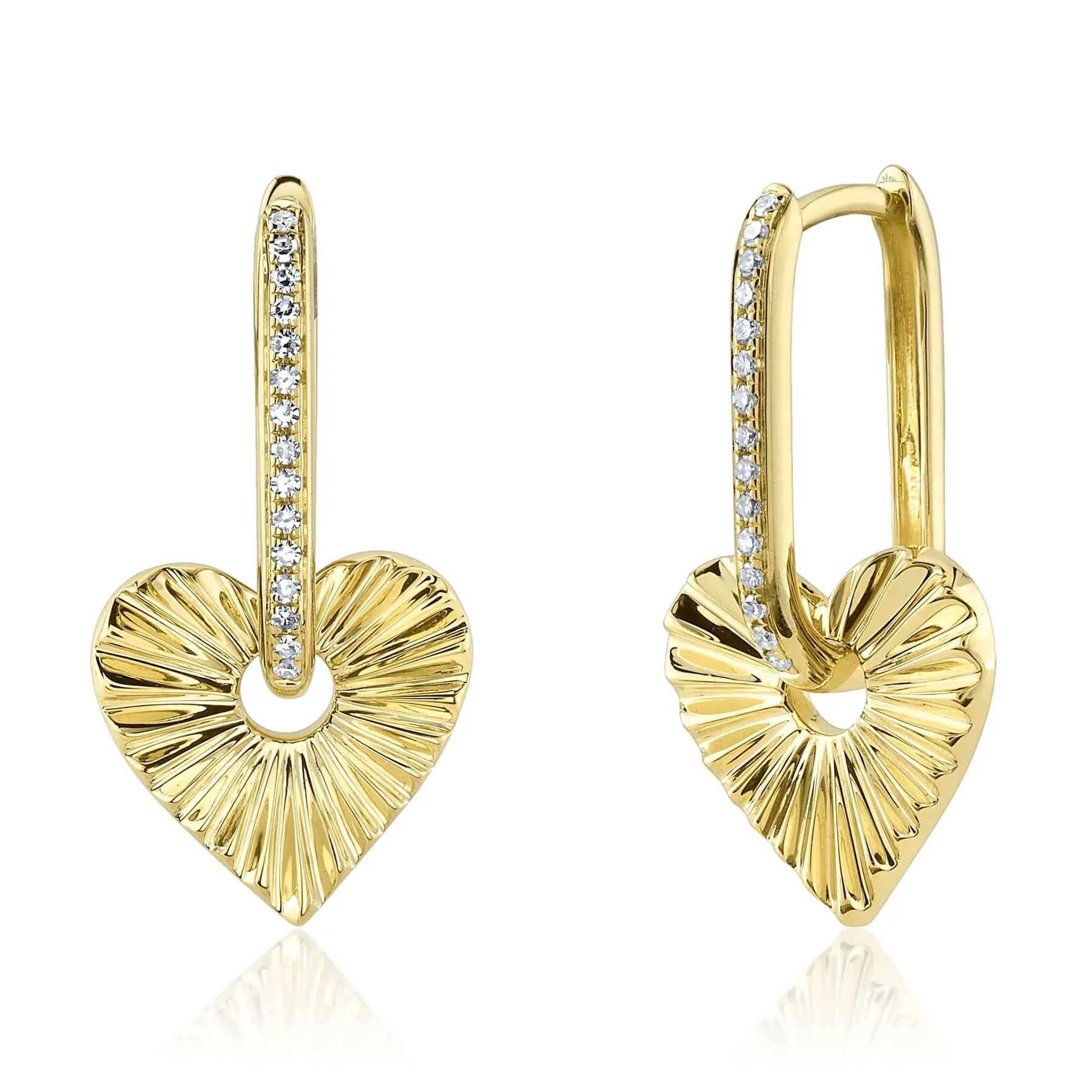 The perfect balance of elegance and practicality, this piece is designed to suit any style with ease. Shy Creation diamonds are natural and hand-selected. All stones are unique and hand set. As a result, you can expect slight variations in the shade, hue, tint of the color stones and stone count.-14k Yellow gold-Round diamonds, 0.08cts-Dimensions, 0.85"L / 0.45"WItem# 805-01765 Diamond Heart Earrings