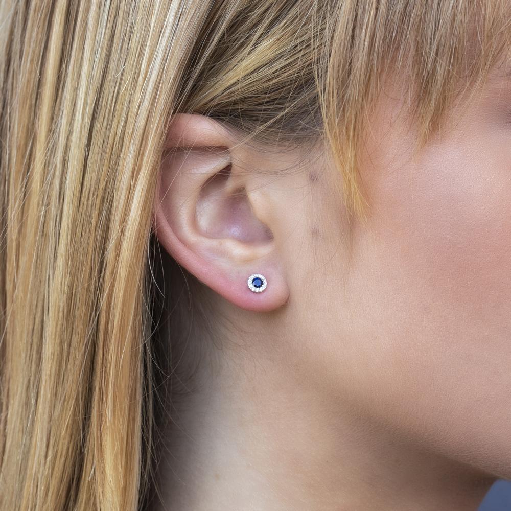 Chic yet understated, these studs bring everyday elegance to any look. All Shy Creation diamonds are natural and hand-selected. All stones are unique and hand set. As a result, you can expect slight variations in the shade, hue, tint of the color stones and stone count.-14k White gold-Round blue sapphires, 0.28cts-Round diamonds, 0.08cts-Dimensions, 0.20"L / 0.20"WItem# 805-01773 Diamond & Blue Sapphire Stud Earrings