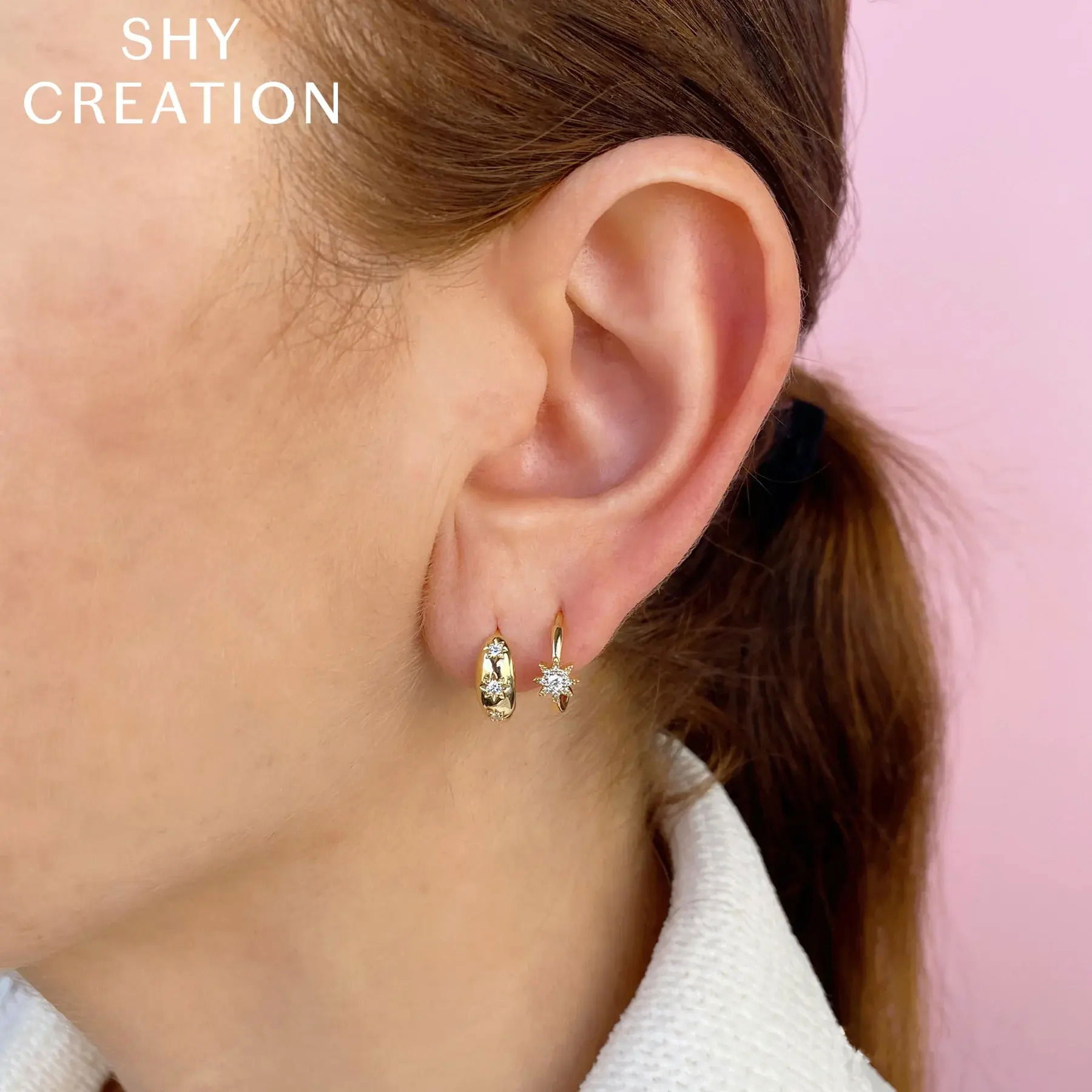 Enjoy a piece that combines standout style with all-day comfort, making it perfect for any occasion. All Shy Creation diamonds are natural and hand-selected. All stones are unique and hand set. As a result, you can expect slight variations in the shade, hue, tint of the color stones and stone count.-14k White gold-Round diamonds, 0.10ctsItem# 805-01778 Diamond Starburst Huggie Earrings