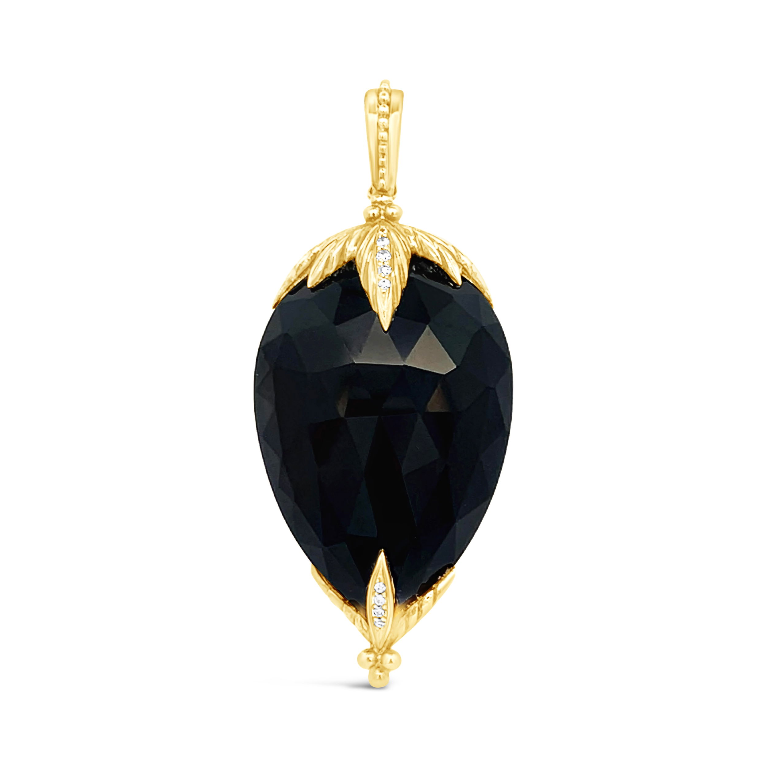 This finial quartz is an elegant piece that will add to any ensemble. Pair it with a convertible wrap from the "It's a Wrap" collection for a stylish, multi-functional accessory.-18k yellow gold-1 Quartz, 70.71cts-9 Round Diamonds, 0.10ctsItem# 806-00274 Smokey Quartz Shard Pendant