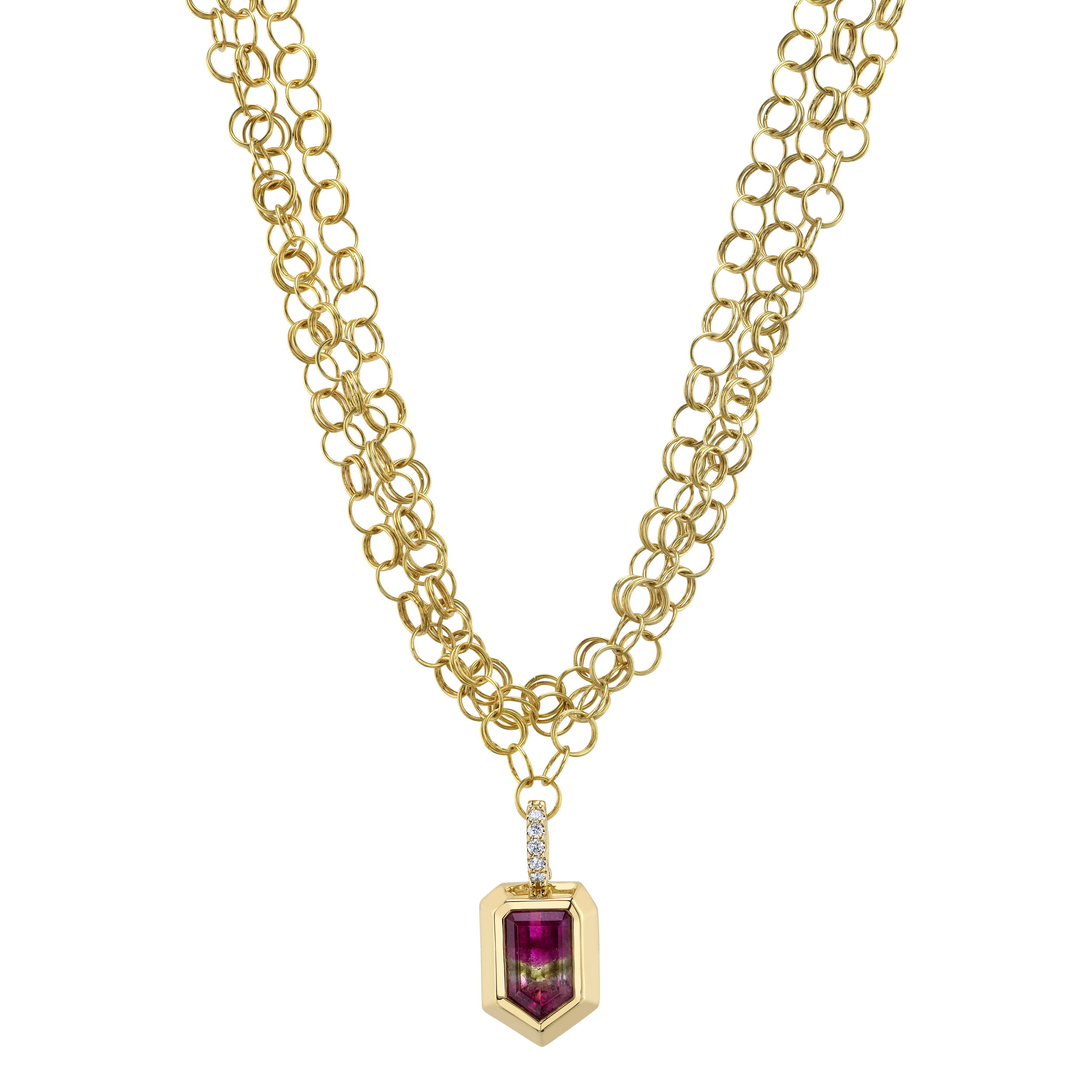 The Odyssey pendant features a vibrant tourmaline stone set in 18k yellow gold. Its bold design makes it a striking piece, perfect for those who love a journey in style.-18k Yellow gold-Tourmaline, 4.96cts-Round diamond, 0.09ctsItem# 806-00452 Odyssey Pendant
