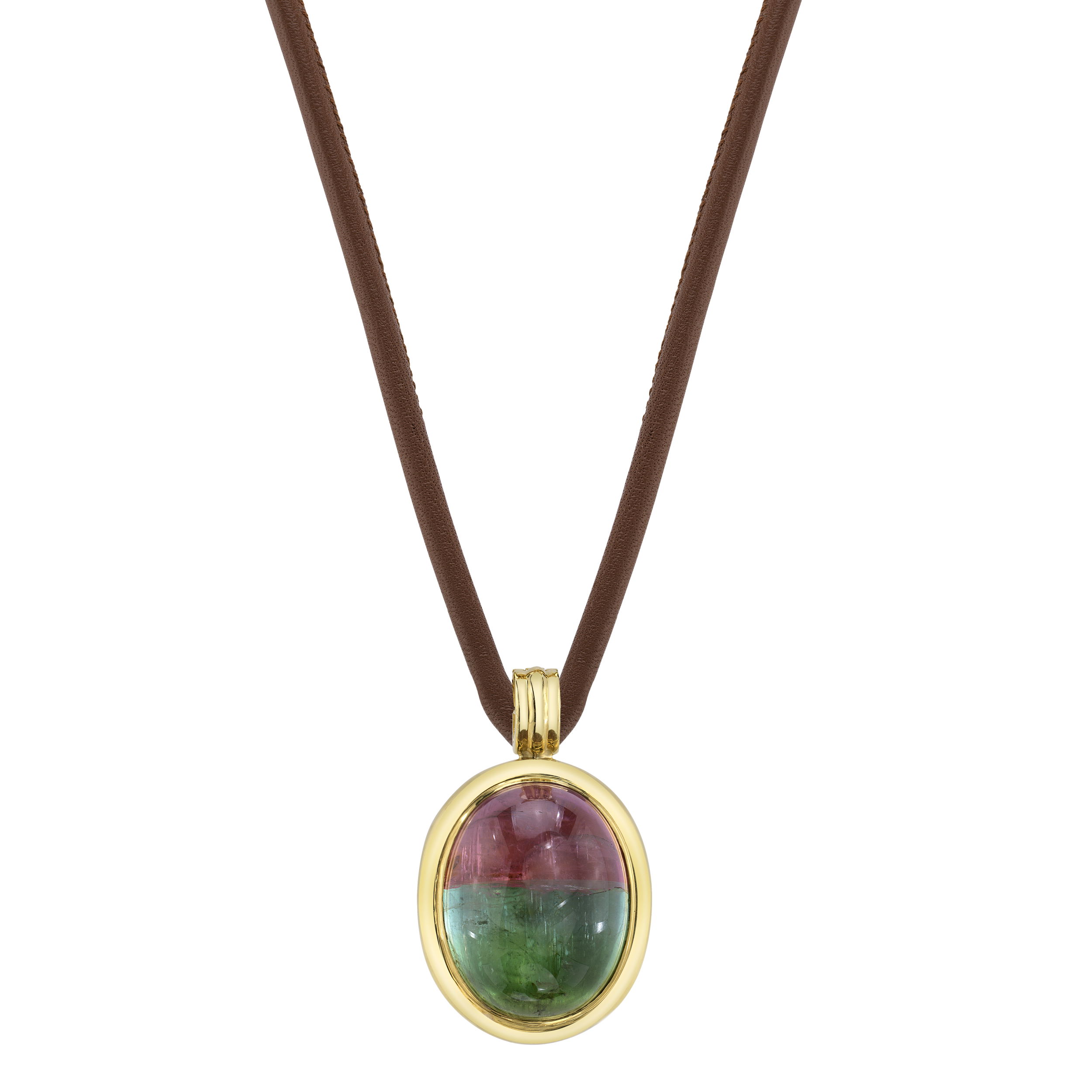 This 18k yellow gold pendant features a stunning two-tone cabochon tourmaline, bringing vibrant color and elegance to any look. Its sleek design and unique hues make it an eye-catching piece. Best wishes, Valerie!-18k Yellow gold-Cabochon two-tone tourmaline, 62.70ctsItem# 806-00454 Best Wishes Pendant