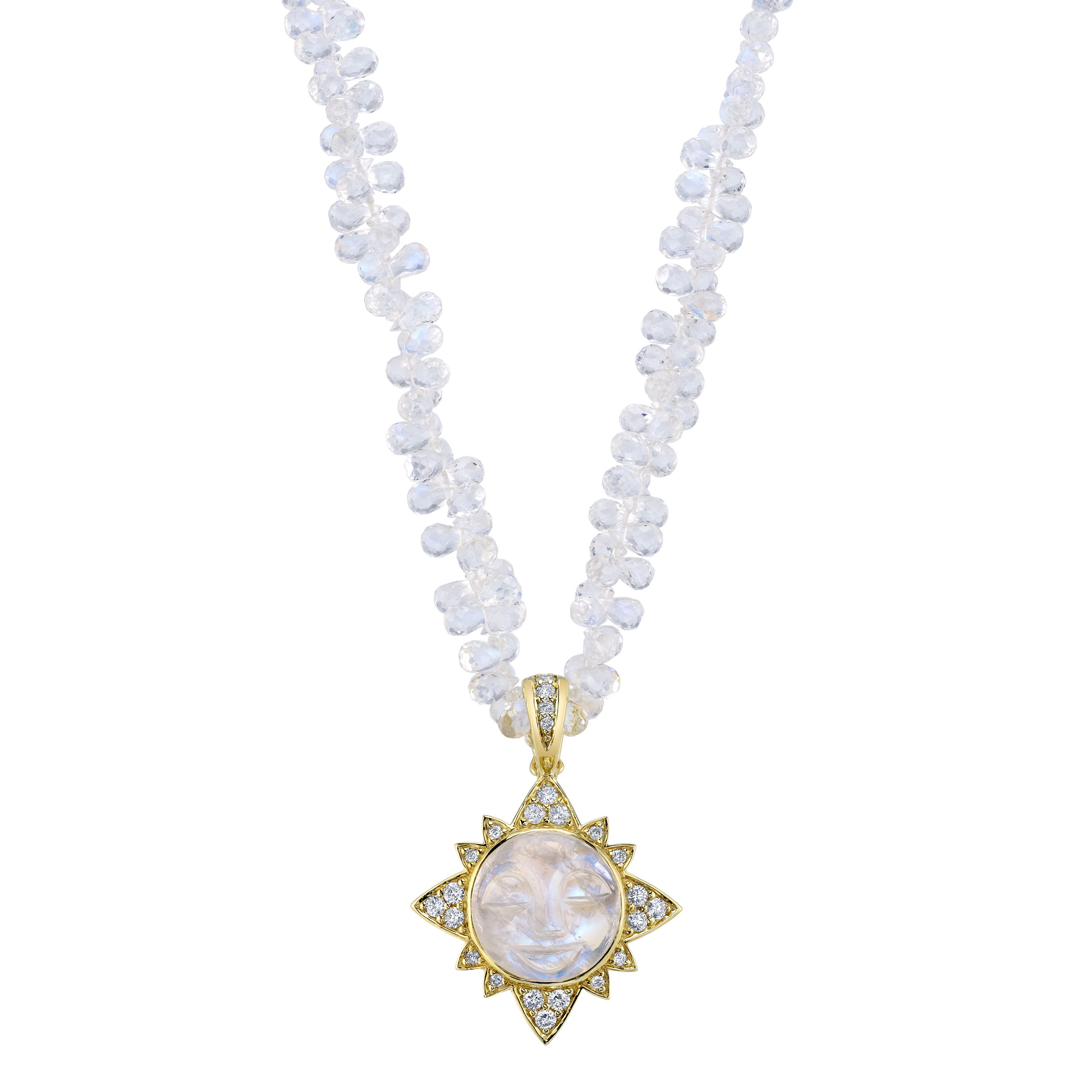 This pendant features a serene, face-carved white moonstone at the heart of a sun-shaped 18k yellow gold setting, accented by 24 twinkling diamonds. It's the perfect piece for anyone who wants to light up the room more than they already do. Paired perfectly with the Cassia necklace. Cassia necklace sold separately. -18k yellow gold-Round diamonds, 0.82cts-Carved moonstoneItem# 806-00505 El Sol Pendant