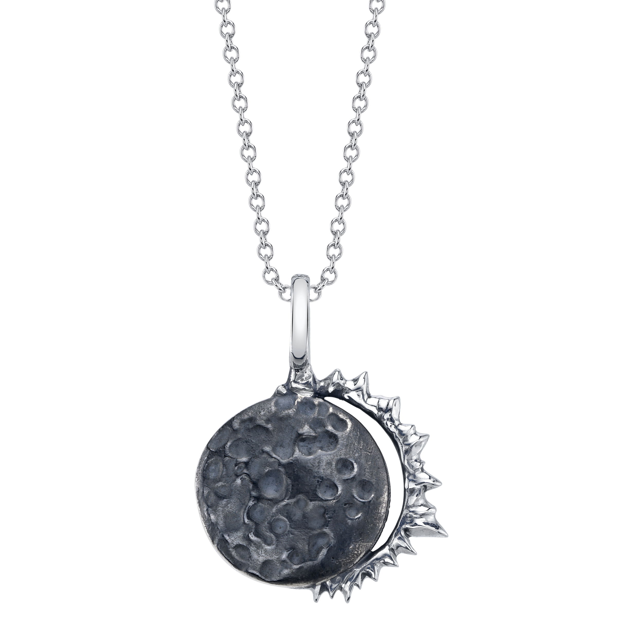 The Eclipse Pendant, crafted in sterling silver, captures the captivating beauty of an eclipse. Inspired by the natural phenomenon, this unique piece is a standout addition to any collection.-Sterling silverItem# 806-00518 Eclipse Pendant in Sterling Silver