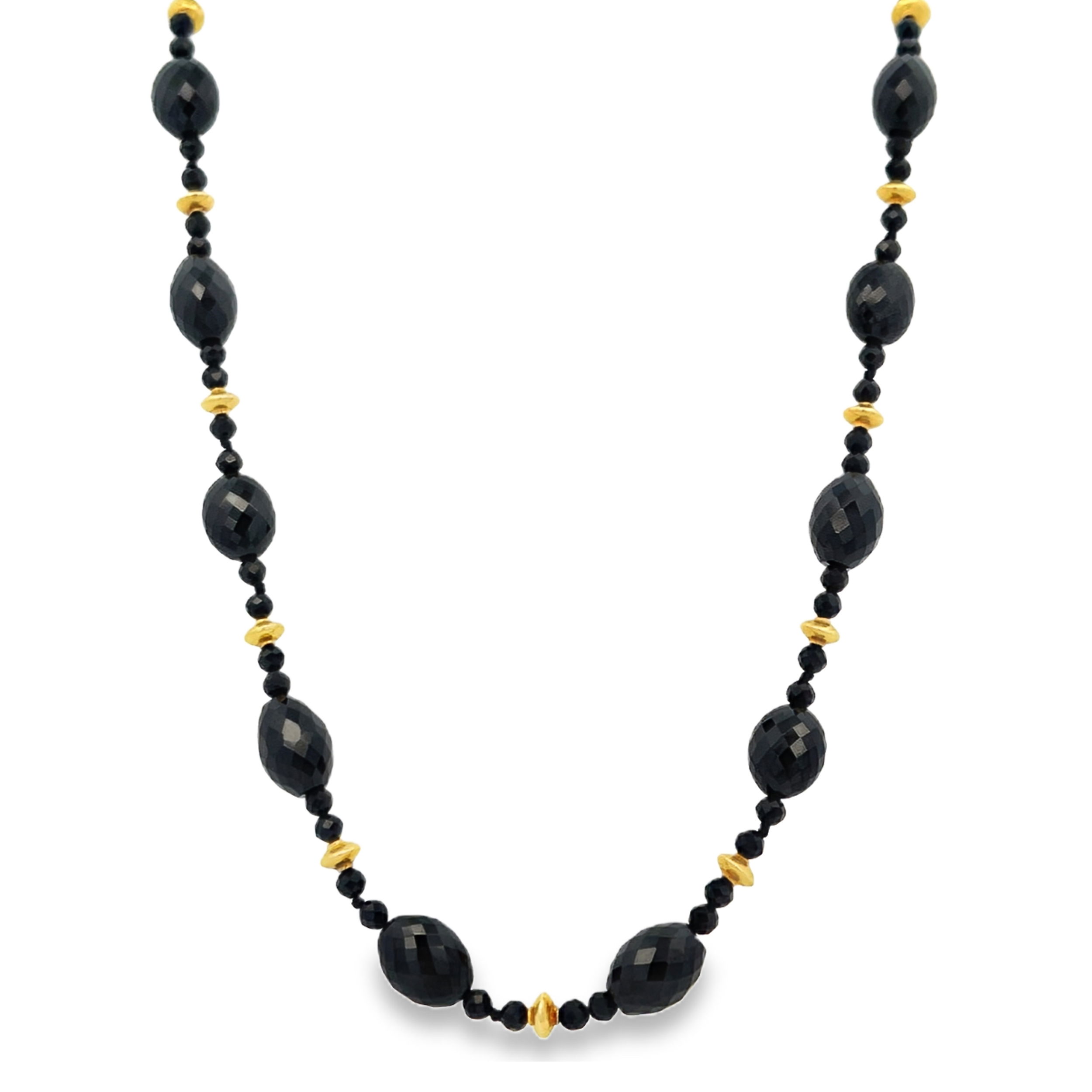 This 18k yellow gold necklace features faceted spinel, adding a subtle shimmer to any outfit. Its timeless design makes it perfect for both everyday wear and special occasions.-18k Yellow gold-Faceted spinel-Length 18.75”Item# 807-00937 Faceted Spinel Necklace