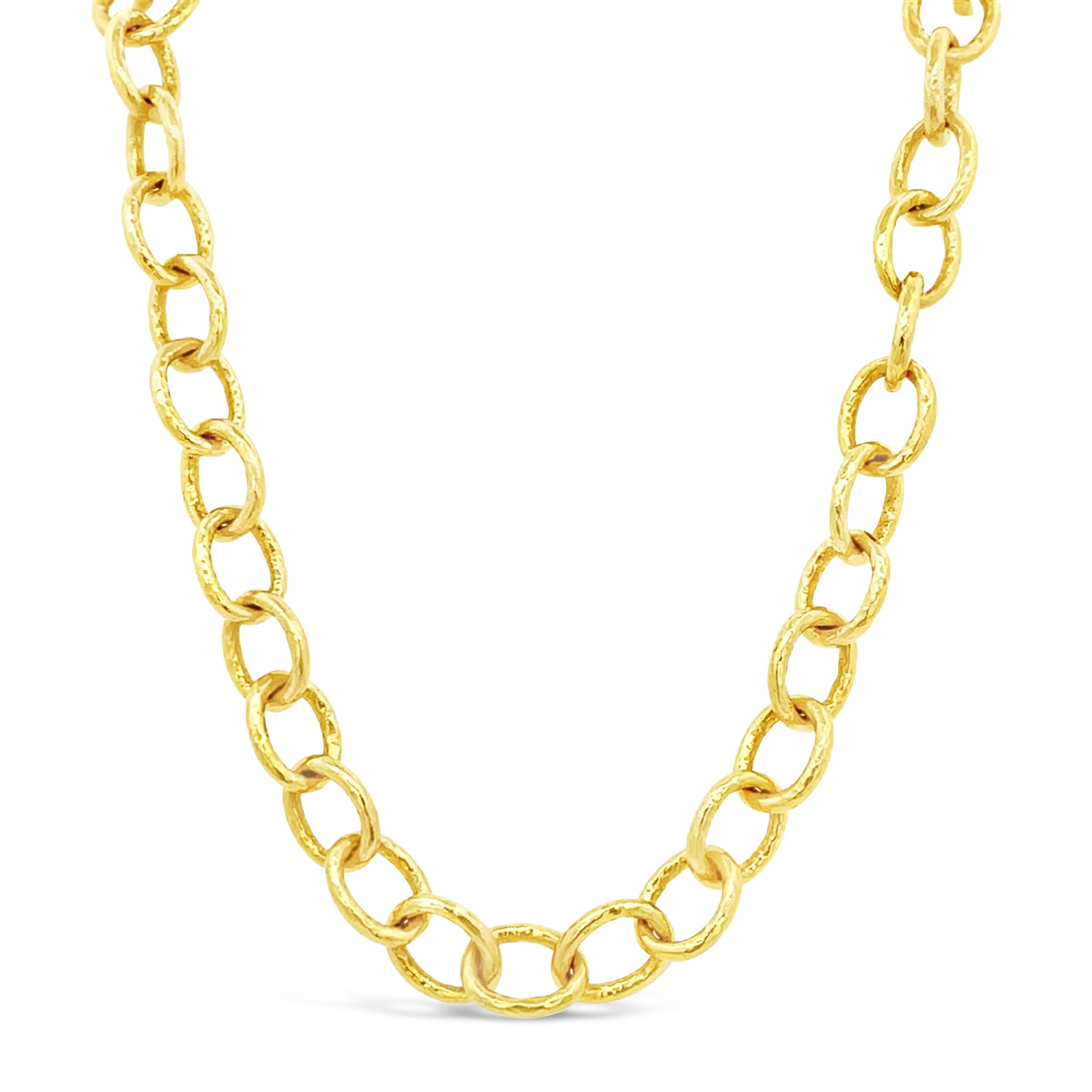 This necklace features oval hammered links crafted in 18k yellow gold, adding texture and shine. Its distinctive design makes it a standout piece for any occasion.-18k Yellow gold-Oval hammered links-Length 24”Item# 807-00954 Oval Link Necklace