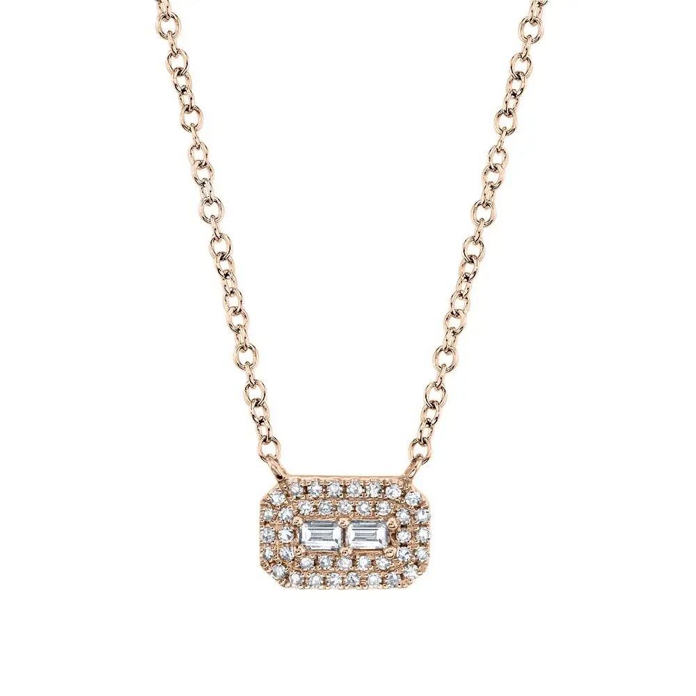 This timeless necklace is the perfect finishing touch to any ensemble. All Shy Creation diamonds are natural and hand-selected. All stones are unique and hand set. As a result, you can expect slight variations in the shade, hue, tint of the color stones and stone count.-14k Rose gold-Round diamonds, 0.09cts-Baguette diamonds, 0.05cts-Dimensions, 0.25"L / 0.35"W-Chain length, 15"-18"Item# 807-01076 Diamond Baguette Necklace