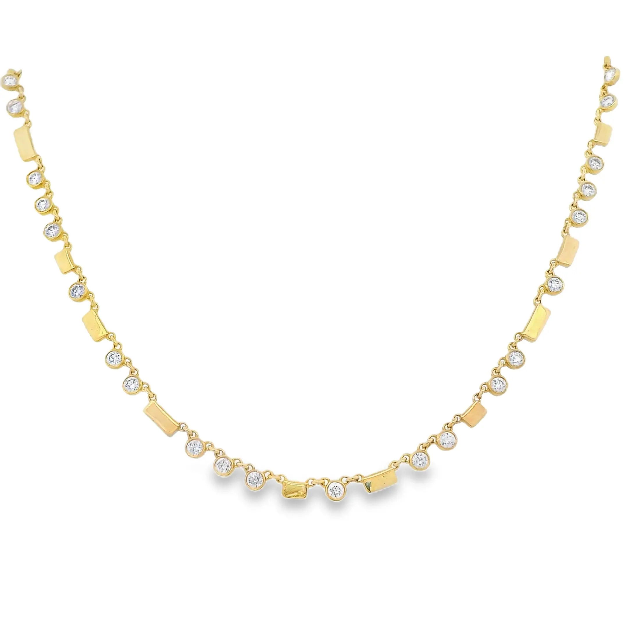 This stunning 18K yellow gold necklace features a delicate design adorned with sparkling diamonds. The alternating rectangular and circular elements create a harmonious balance, making it a perfect accessory for both casual and formal occasions. Its timeless elegance ensures it will be a cherished addition to any jewelry collection.-18k Yellow gold-Diamonds, 1.51cts-Length 16"Item# 001-807-01136 Diamond Necklace