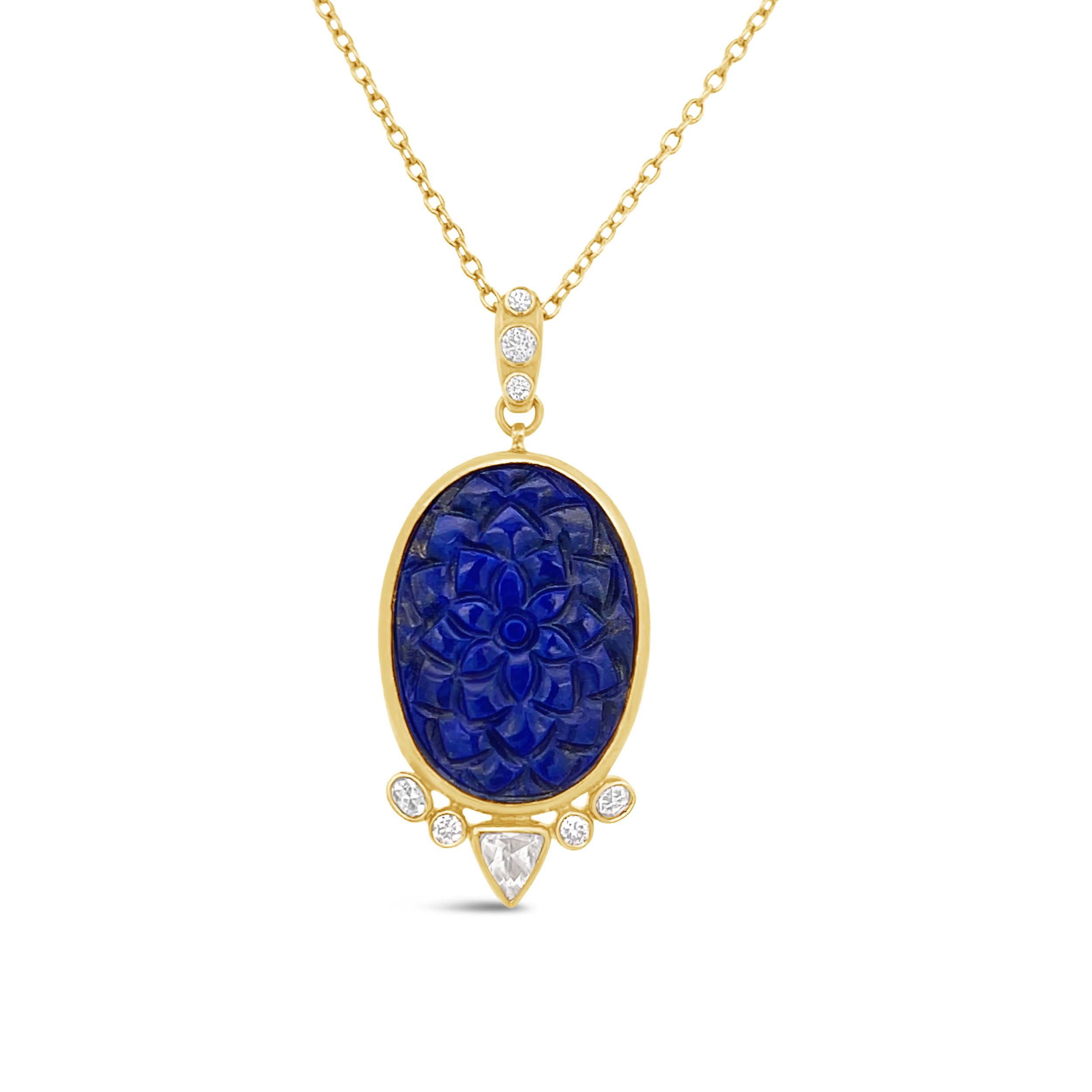 This necklace features a carved lapis pendant set in yellow gold, offering a bold pop of color and texture. Its unique design makes it a standout piece for any jewelry collection.-24k Yellow gold-Lapis, 20.70cts-Diamonds, 0.74ctsItem# 001-807-01140 Carved Lapis Pendant