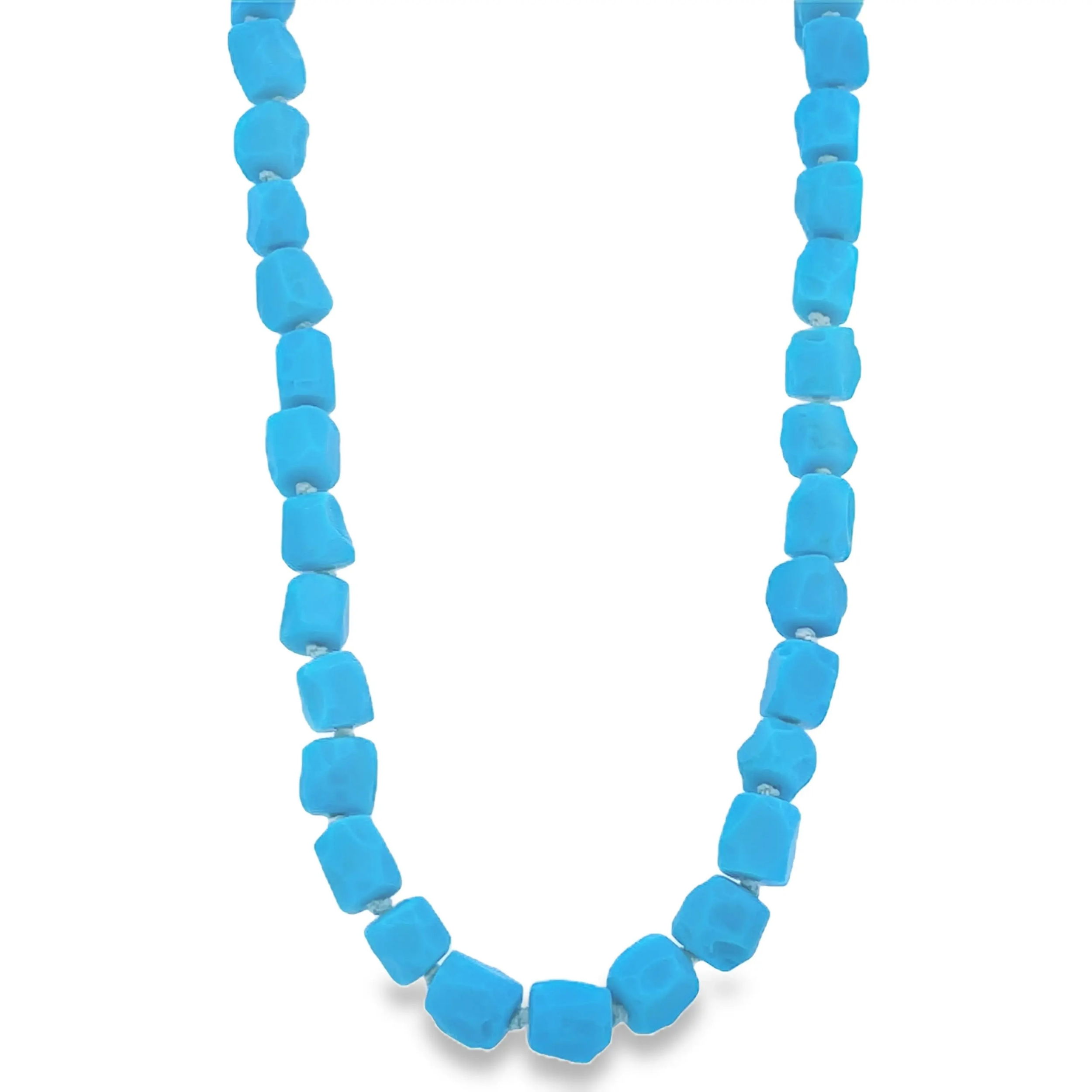 The Turquoise Essence Necklace features vibrant turquoise stones set in 18k yellow gold, offering a timeless and elegant design. Its bold yet classic style makes it an ideal choice for any occasion.-18k Yellow gold-Turquoise beads-Length 18”Item# 807-01240 Turquoise Essence Necklace