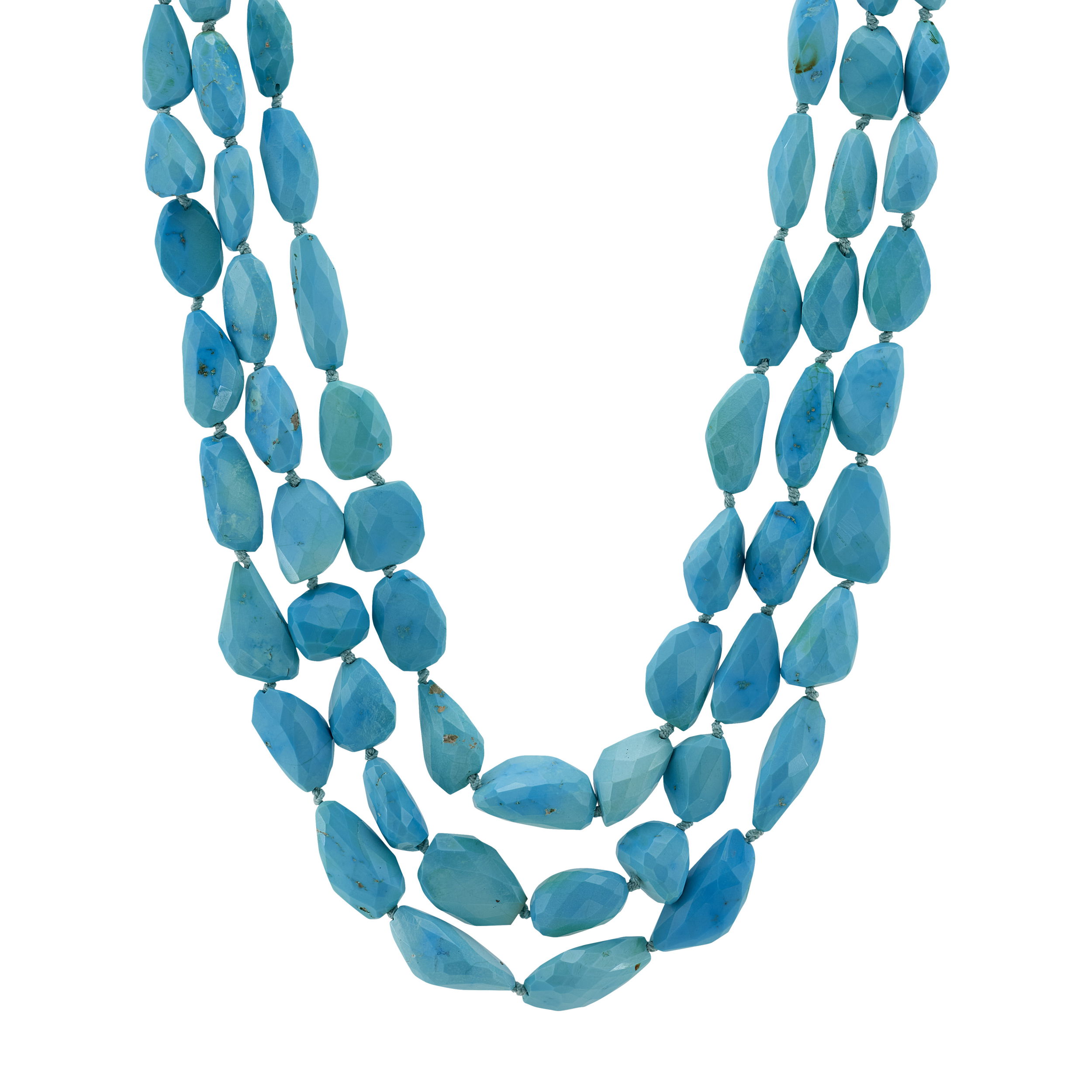 This three-strand necklace showcases vibrant turquoise beads, elegantly finished with a sterling silver clasp. Its layered design and striking color make it a perfect statement piece for any occasion.-Sterling silver-Turquoise beadsItem# 807-01243 Three Peace Necklace