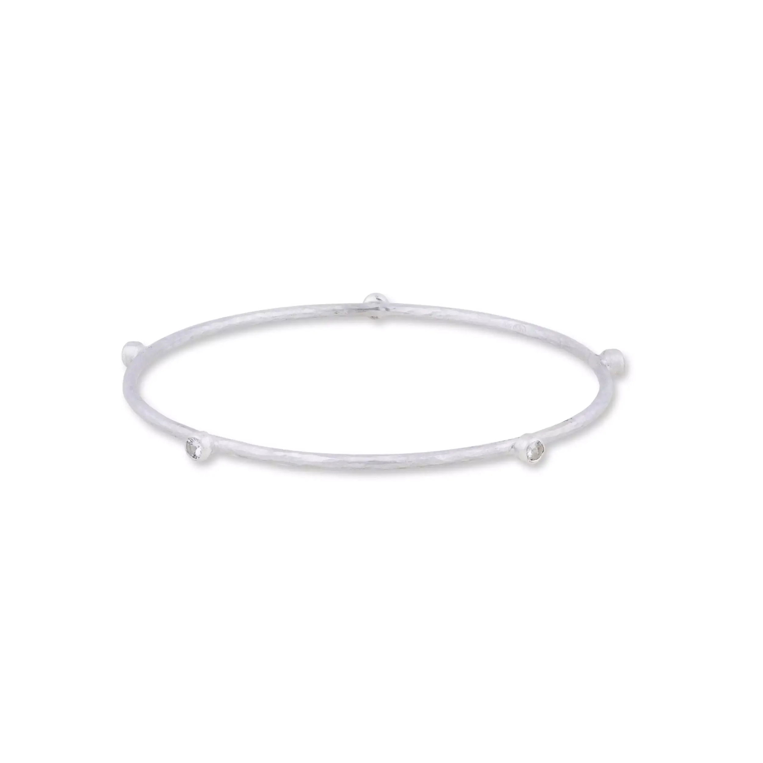 Grace your wrist with this sterling silver bangle bracelet, elegantly adorned with dazzling white sapphires. Its sleek, sophisticated design makes it a versatile accessory. -Sterling silver-White sapphires, 0.60cts-Size 7Item# 001-808-00977 Hammered Silver and White Sapphire Bangle