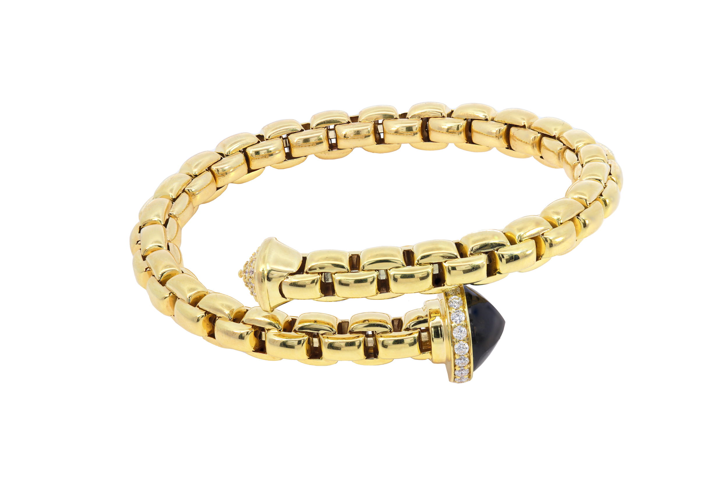 This chain link bypass bangle makes a bold statement with its striking contrast of textures and tones. Featuring pyramid-shaped black onyx accents and shimmering diamonds, it blends edge and elegance in a sleek, sculptural design. A modern piece with timeless appeal.-14k Yellow gold-Round diamonds, 0.85ctsItem# 808-00981 Black Onyx Bypass Bangle