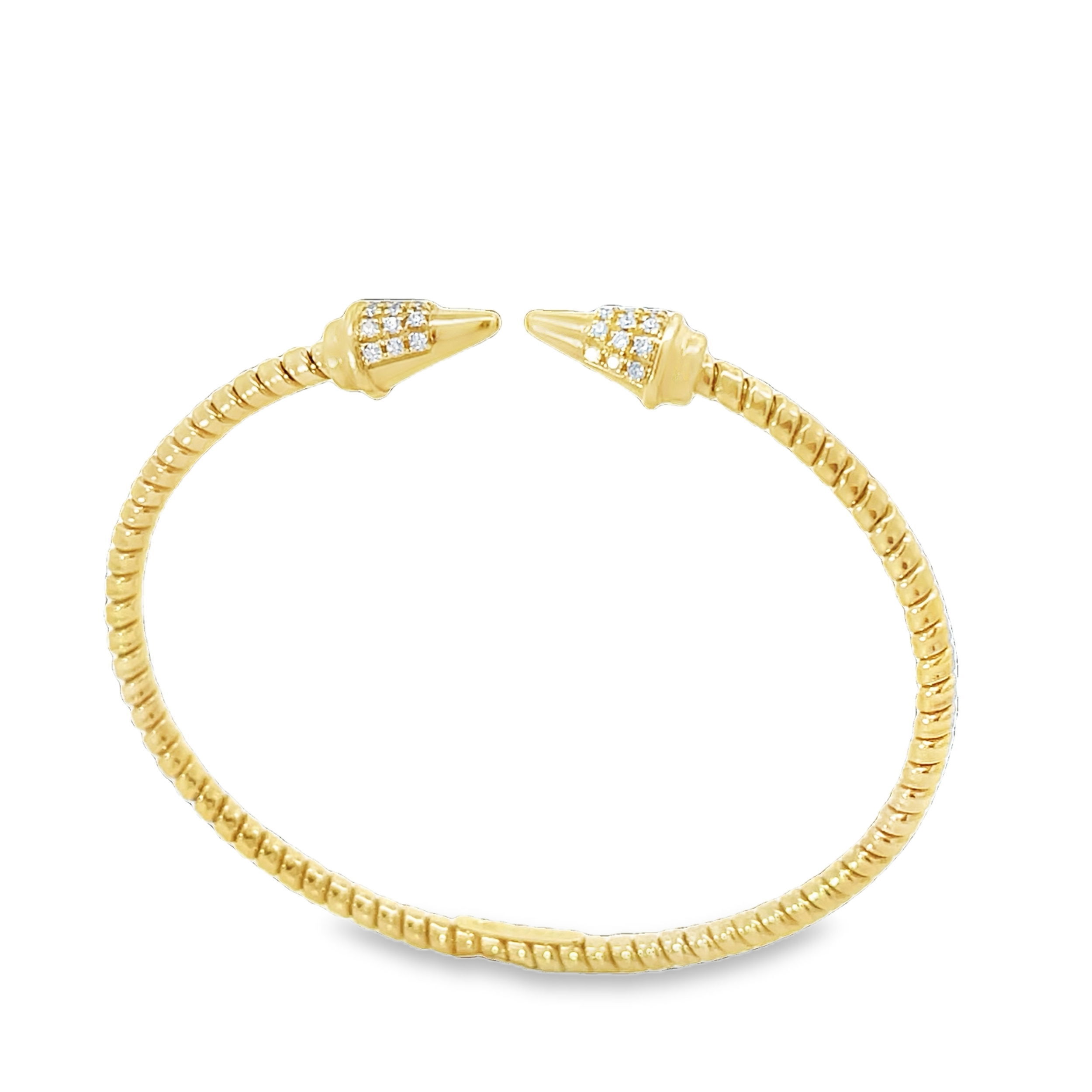 You cannot go wrong with a touch of edge! This coiled spiked diamond bracelet is perfect for daily wear, or for a special night out. A great addition to any collection, this bracelet is promised to turn heads.-14K Yellow gold-Round diamonds, 0.23ctsItem# 808-00996 Spiked Coil Open Bangle