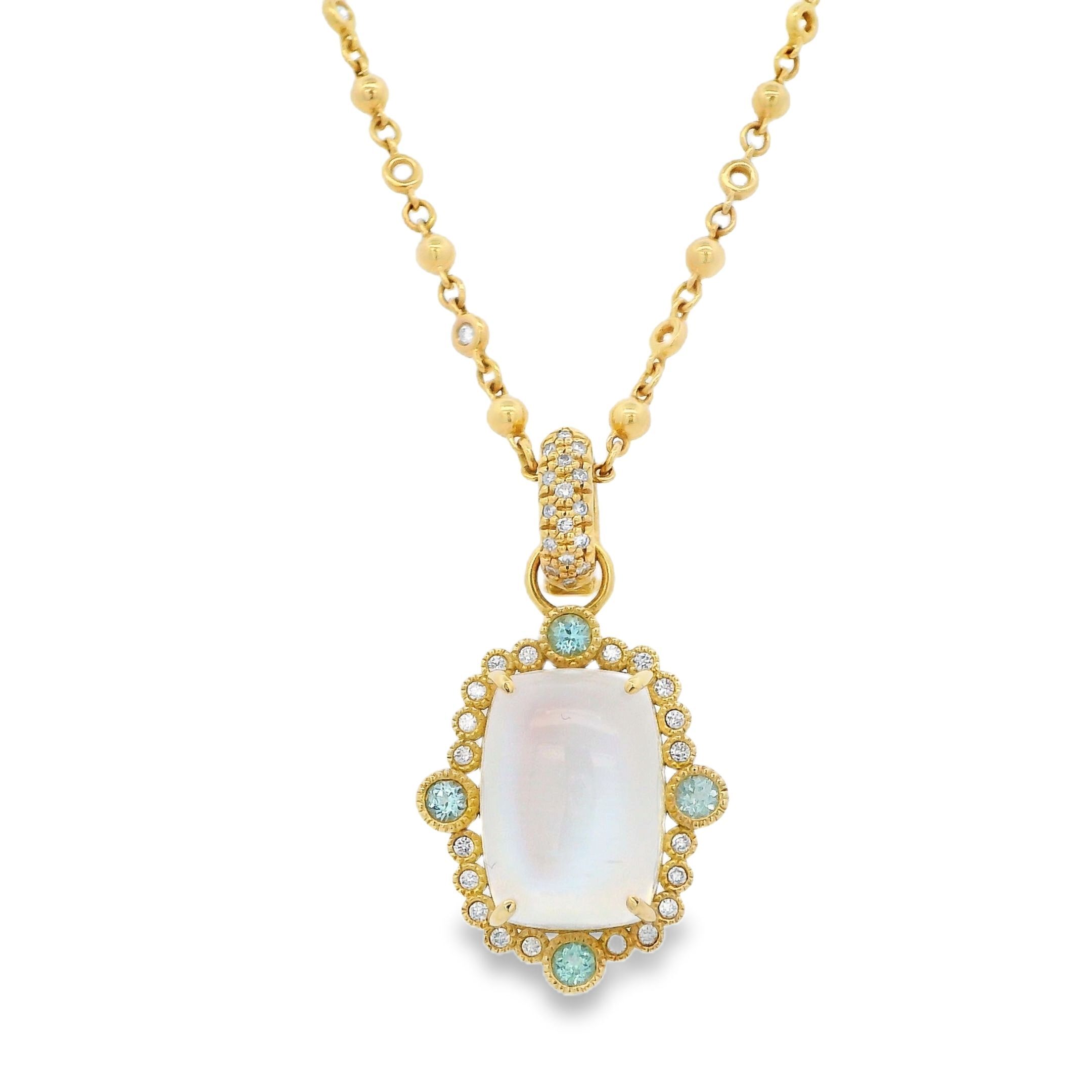 Erica Courtney presents this 18k yellow gold pendant with a moonstone center, accented by tourmalines and round diamonds. Its soft glow and hint of color make it a standout piece. Chain sold separately.-18k Yellow gold-Round diamonds, 0.24cts-Tourmaline, 0.41cts-Moonstone, 13.95ctItem# 001-809-00447 Enchanted Pendant