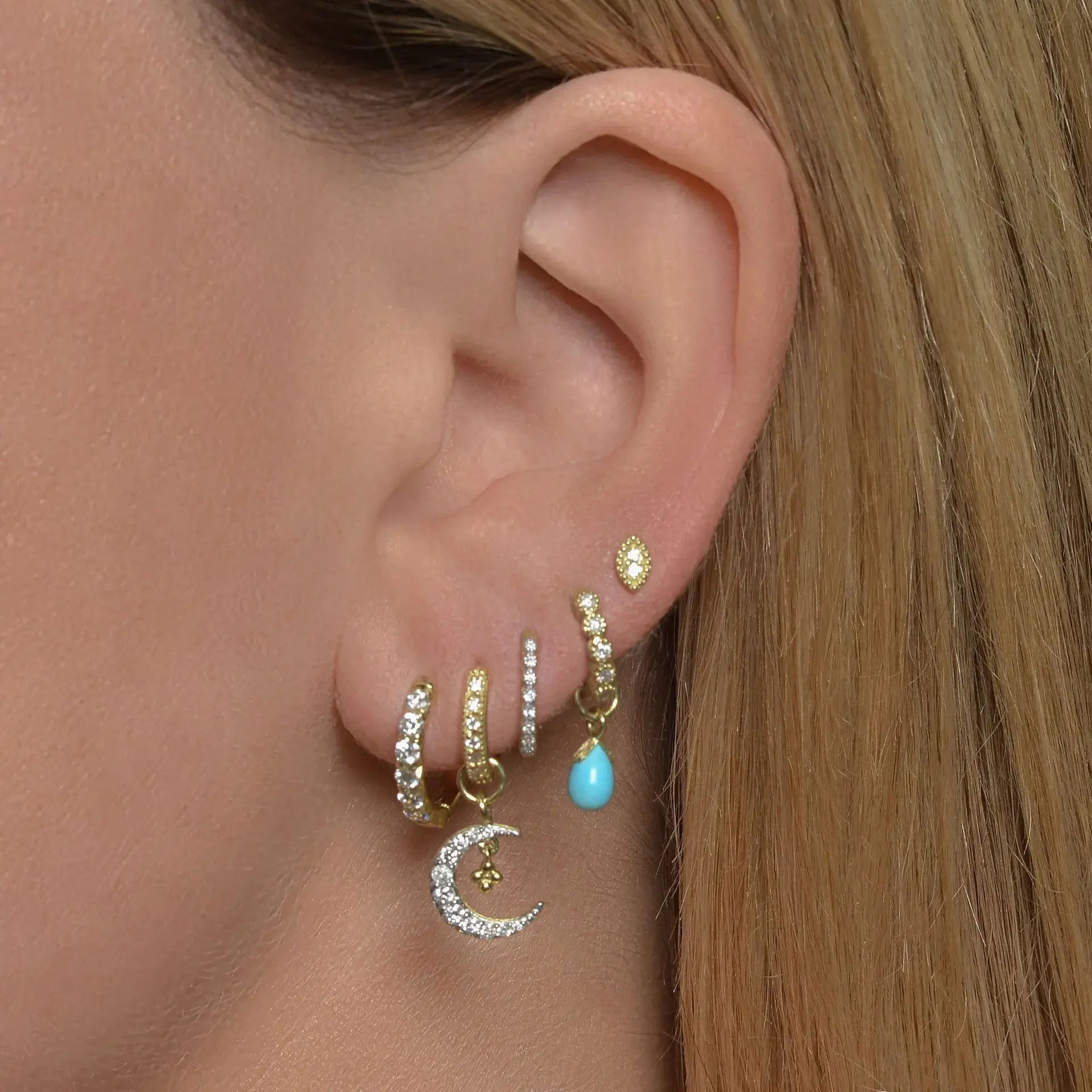 Combining classic elegance with on trend shapes and styles, JFJ offers something for women of all ages. From the Petites Collection, this charm features a briolette turquoise stone set in 18K gold. Hoops and charms sold separately. Charms sold as singles.-18k Yellow gold-Turquoise-Dimensions, 6.0mmItem# 809-00598 Petite Briolette Earring Charm