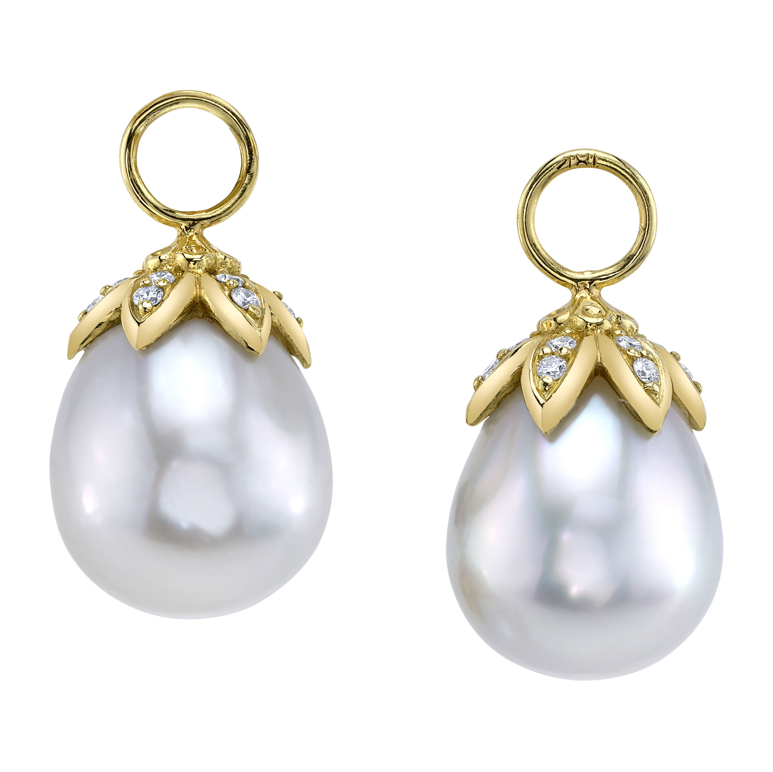 These earrings feature South Sea white pearls set in 18k yellow gold, accented by sparkling round diamonds. The combination of luminous pearls and brilliant diamonds creates a timeless and elegant pair, perfect for elevating any look. Huggies sold separately. -18k Yellow gold-South sea and white pearls-Round diamonds, 0.24ctsItem# 809-00690 Leigh Earring Charms